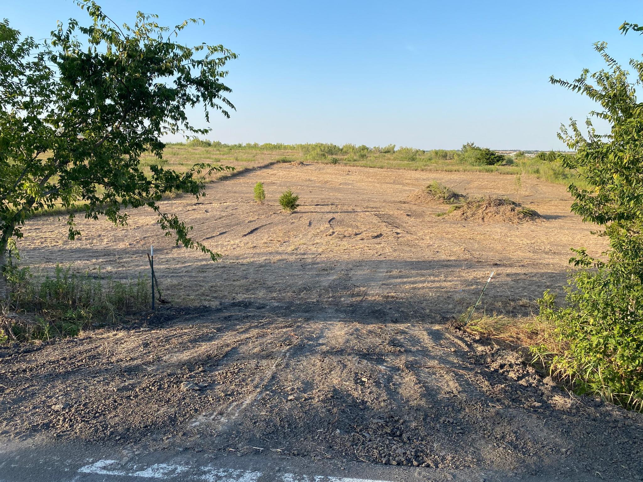 Expansive land parcel featuring cleared, level te