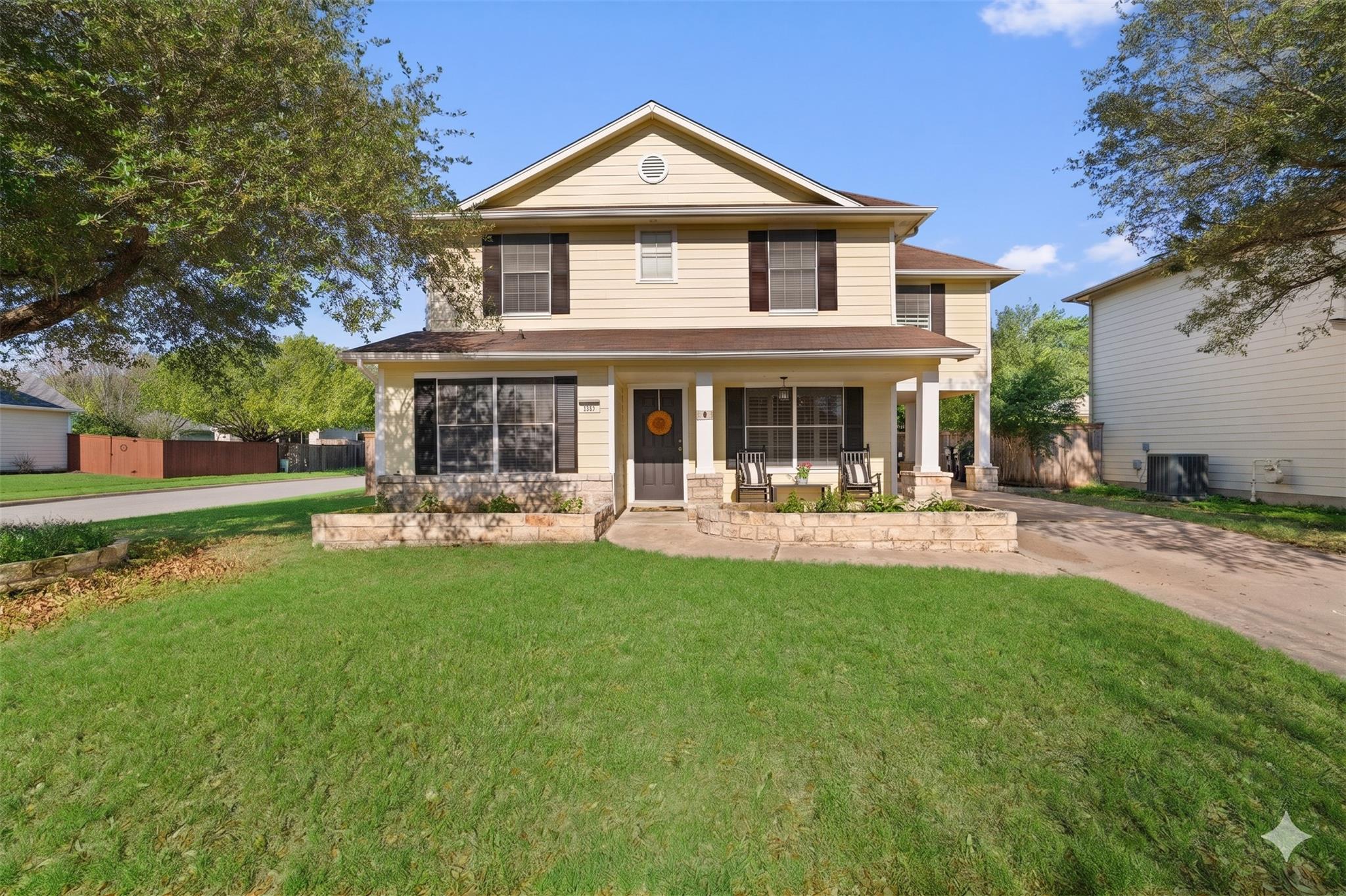Two-story residence with a covered front porch an