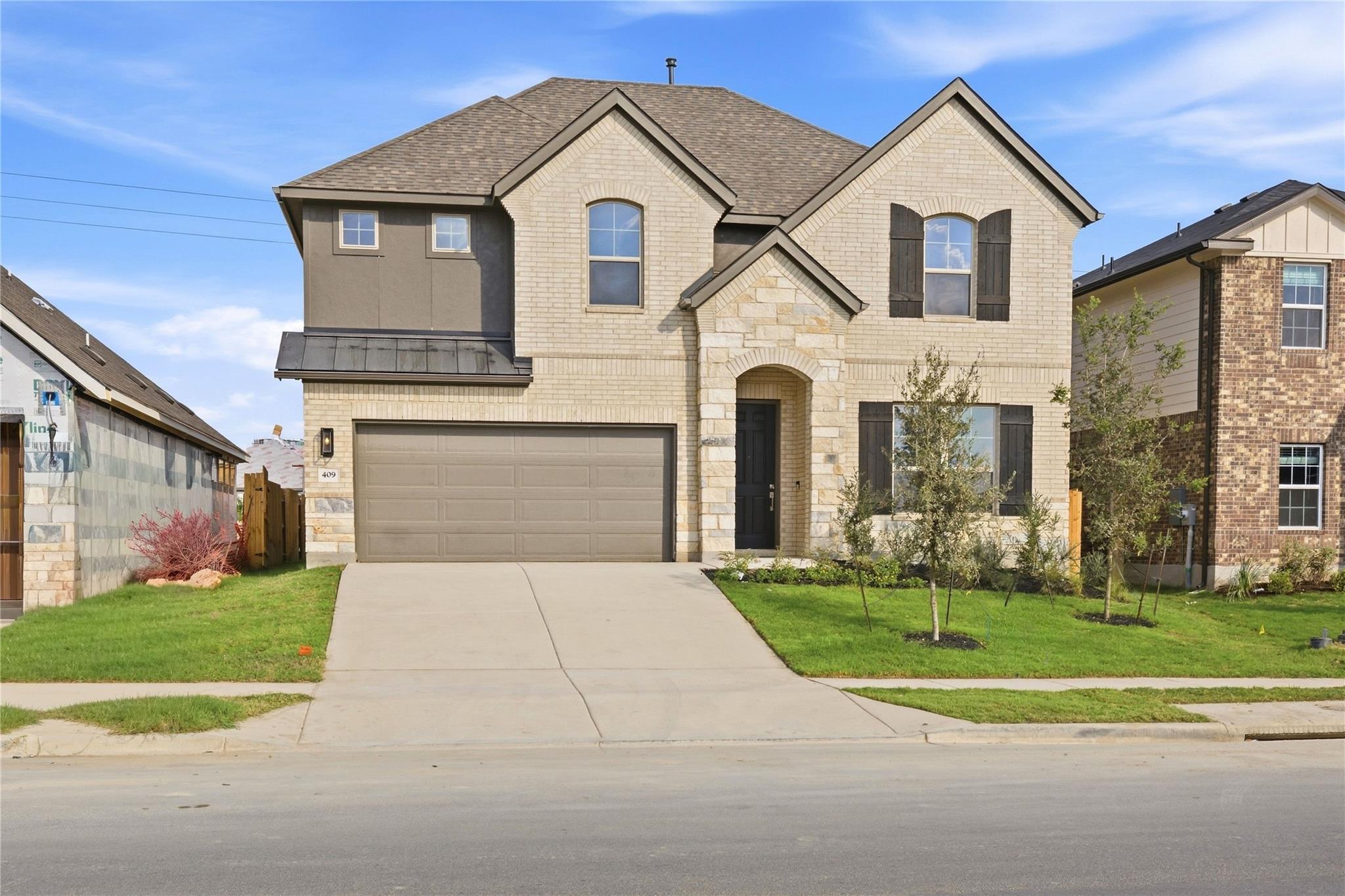 Listing photo 1 of 409  Grey Leaf Rd