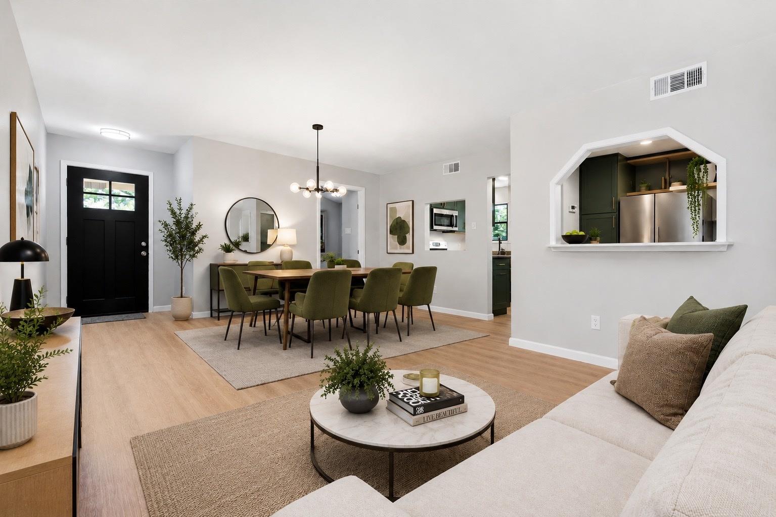 An inviting open-concept living and dining area w