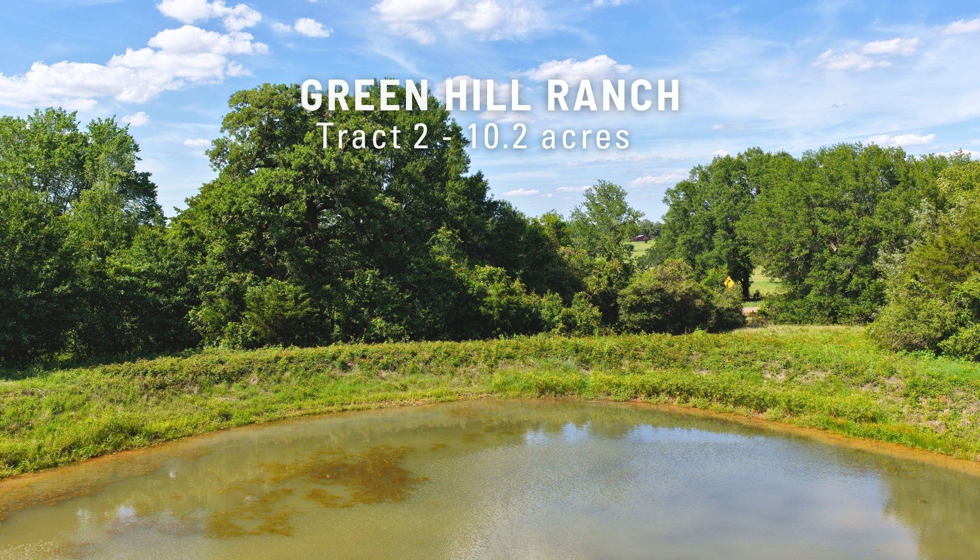 Expansive 10.2-acre parcel featuring a natural po