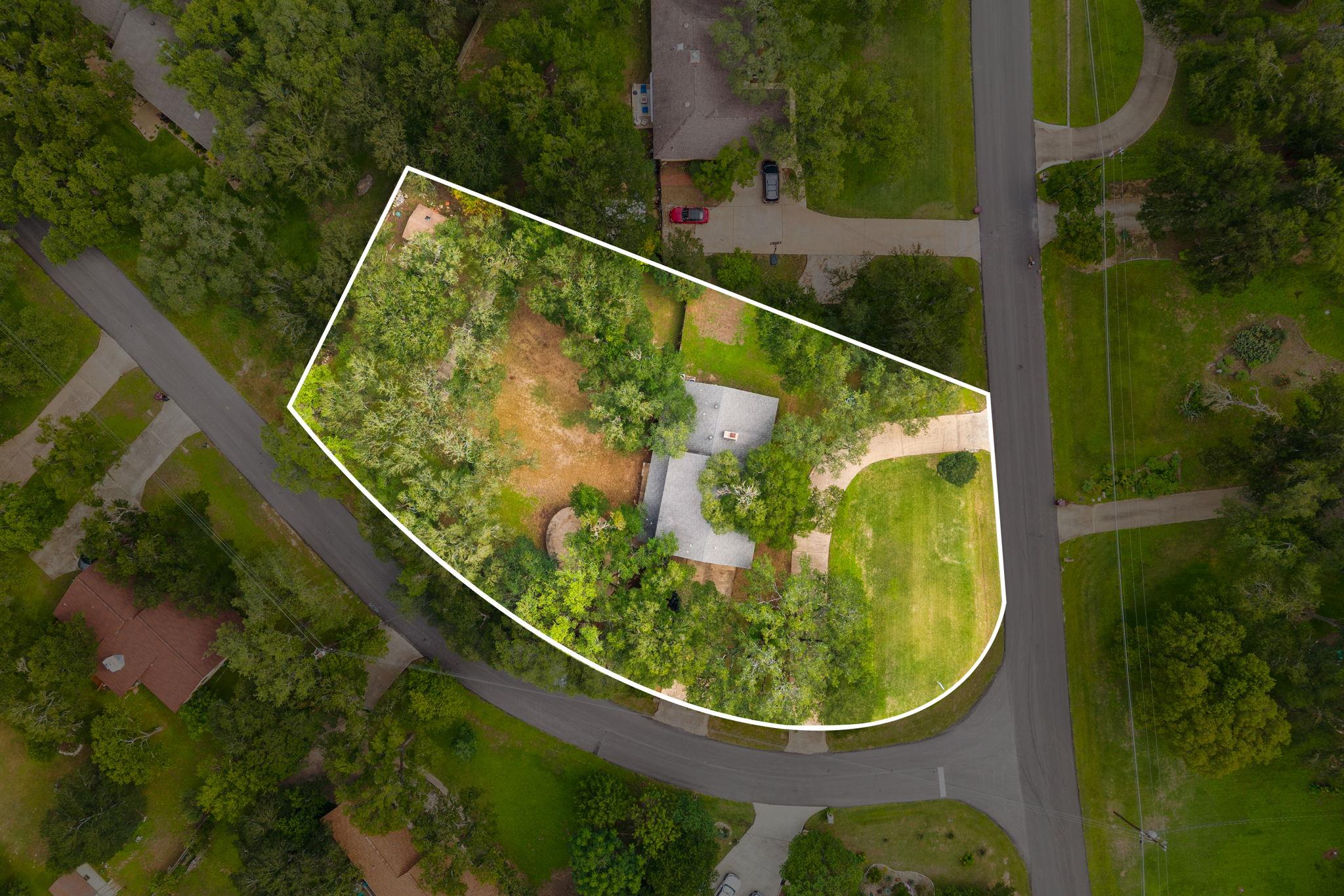A verdant, tree-lined property offering a tranqui