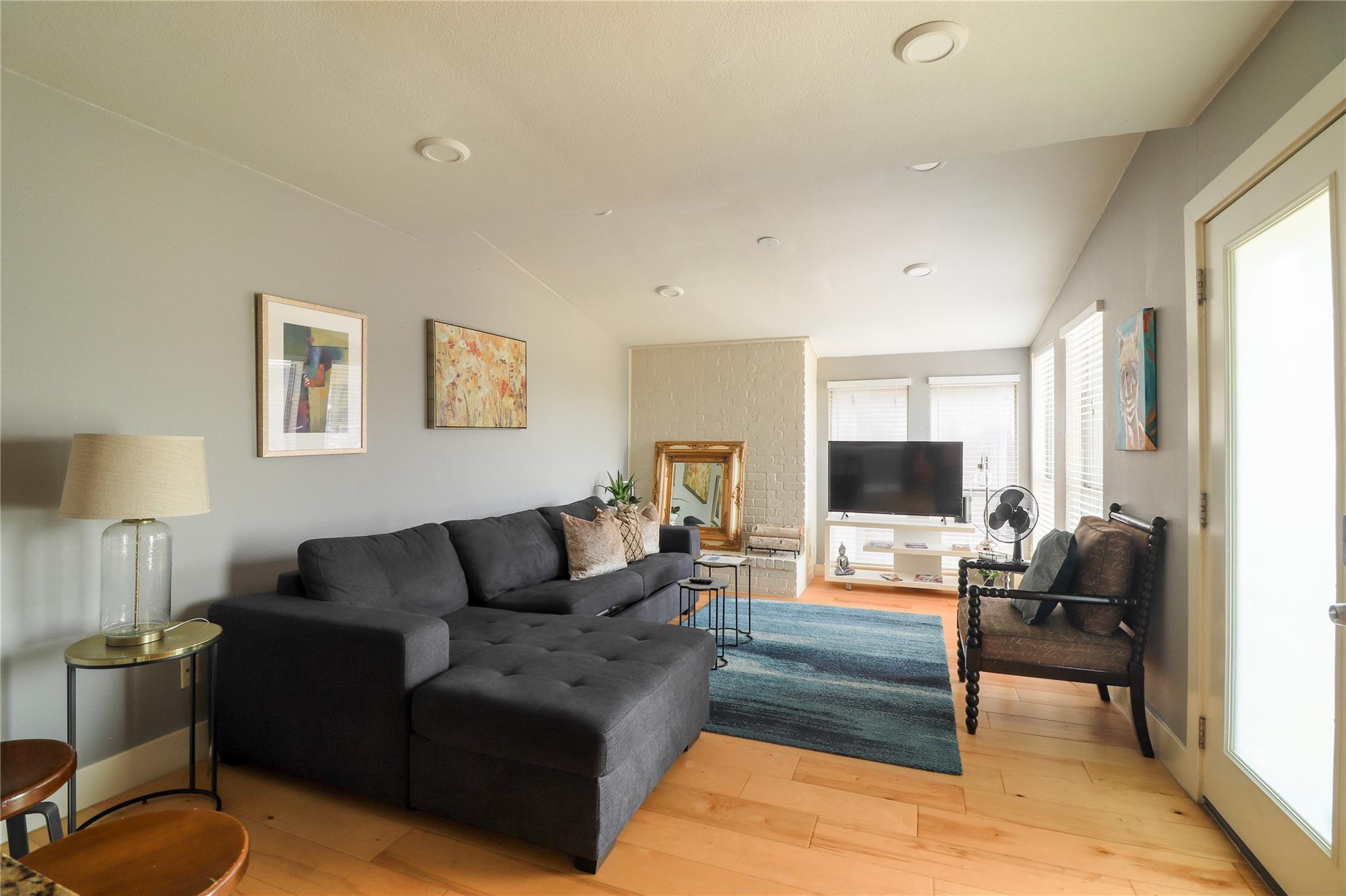 Living area featuring light wood-finish flooring,