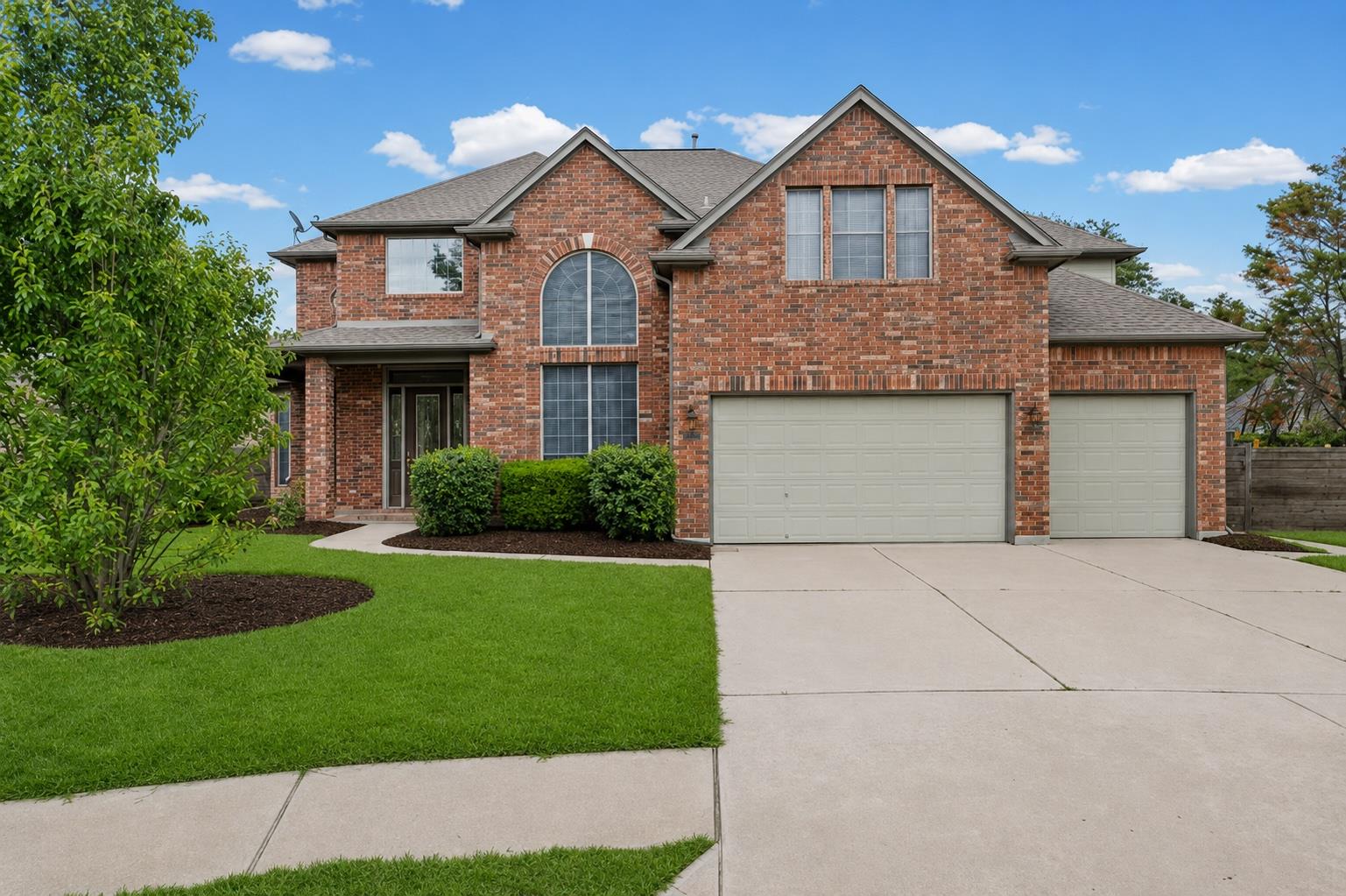 Traditional brick exterior with architectural shi