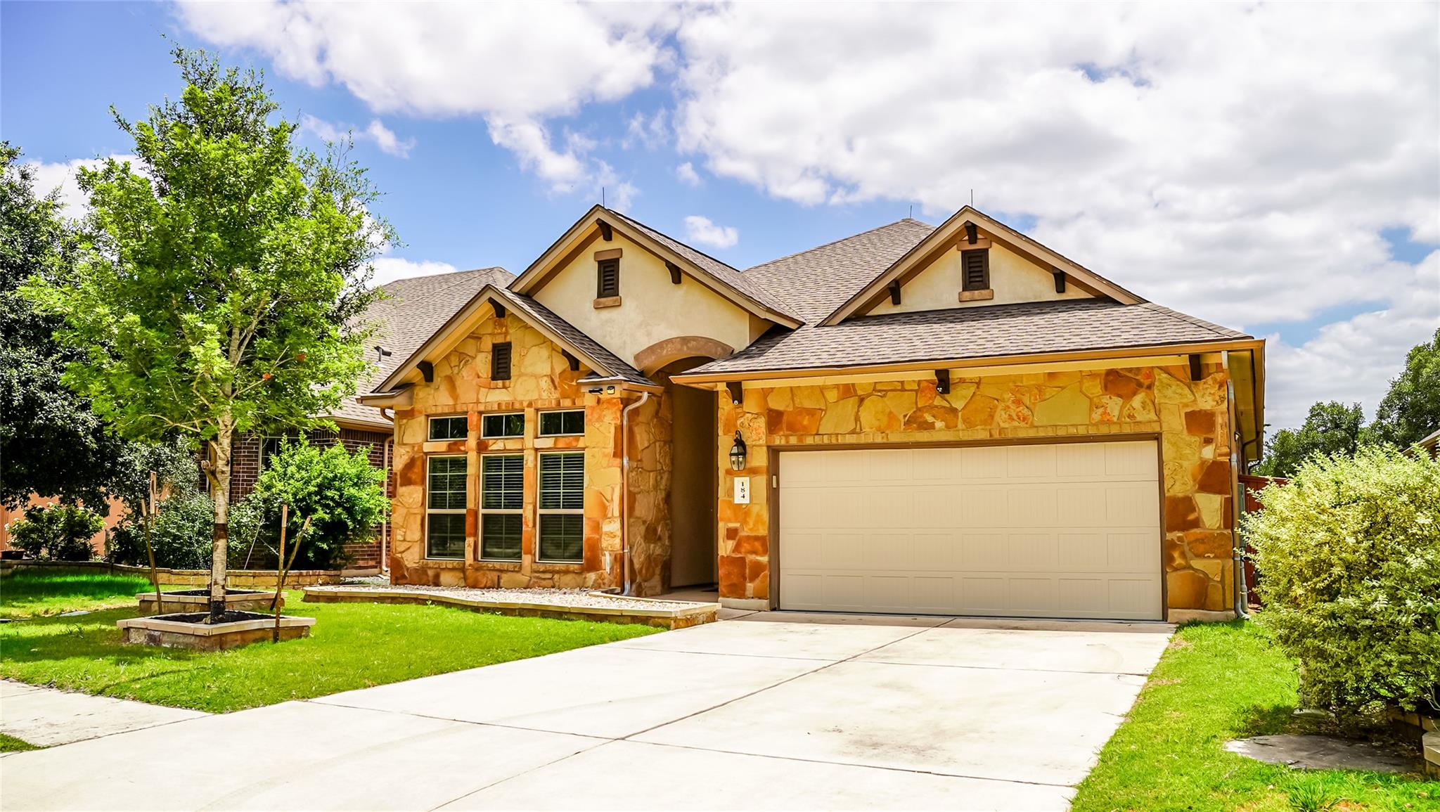 Crafted with elegant stonework, this charming hom