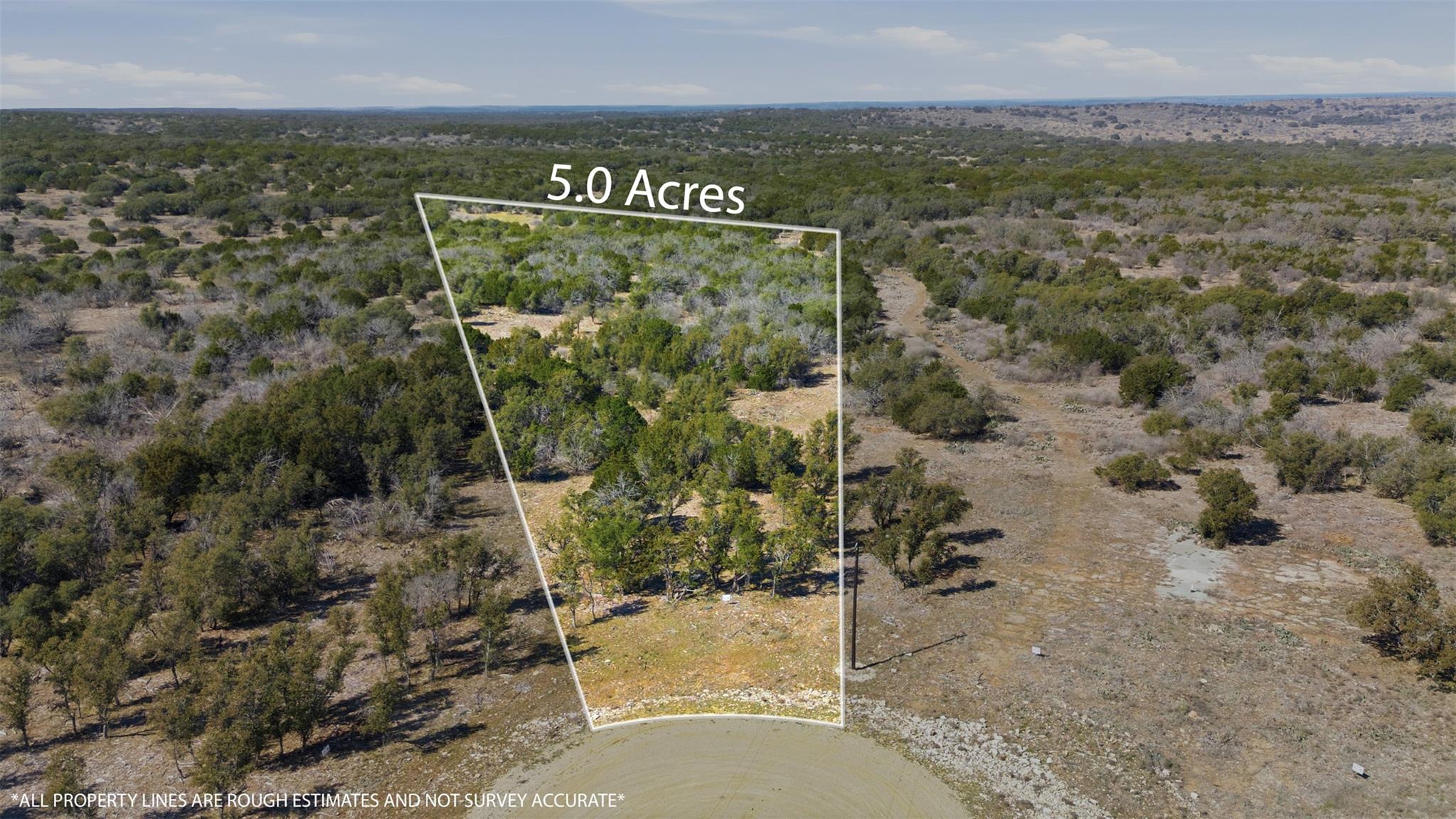 Expansive 5.0-acre property featuring a mix of ma