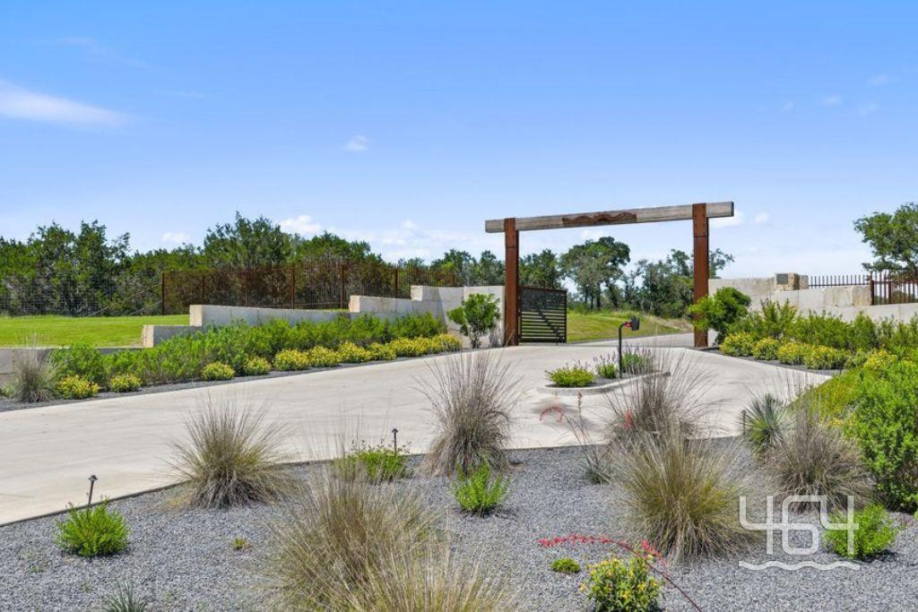 Entrance featuring a decorative wood and metal ar