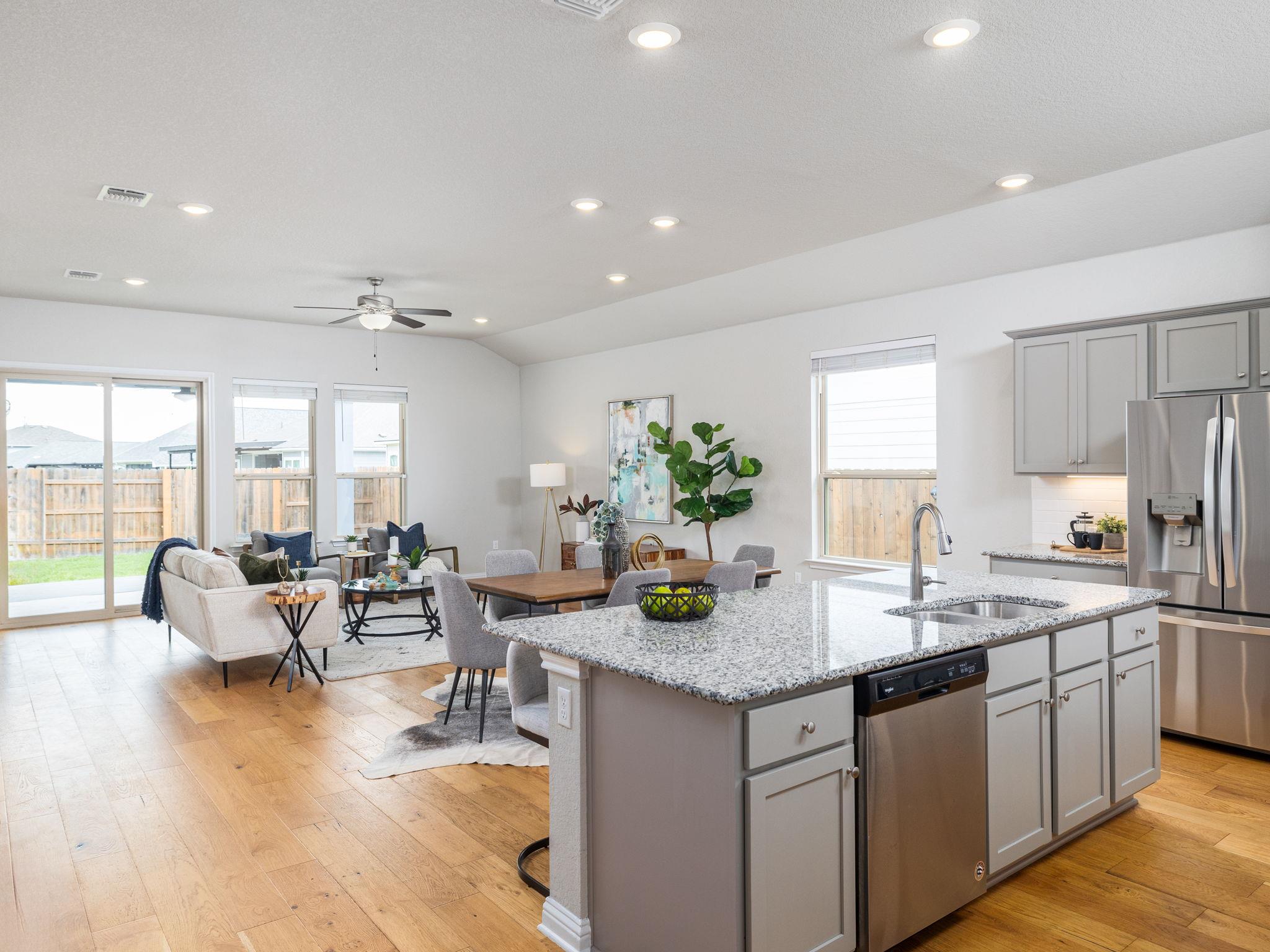 Open-concept interior featuring light wood-finish