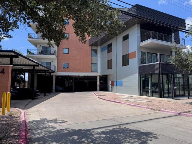 Modern multi-story building featuring private bal