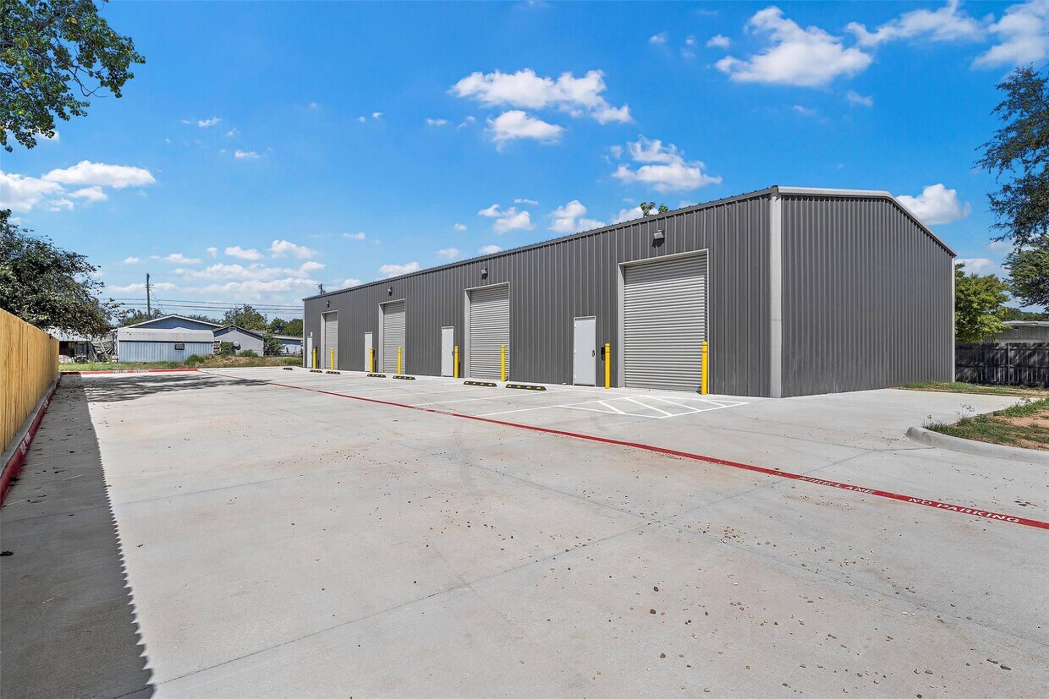 Commercial metal-sided building featuring multipl