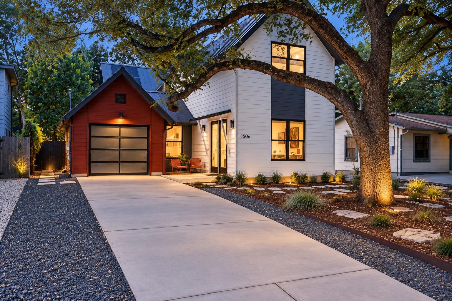 Crisp modern siding and a smooth concrete drivewa