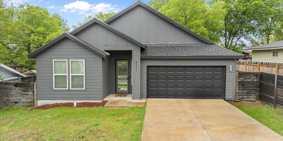 Contemporary gray exterior with dark trim accents