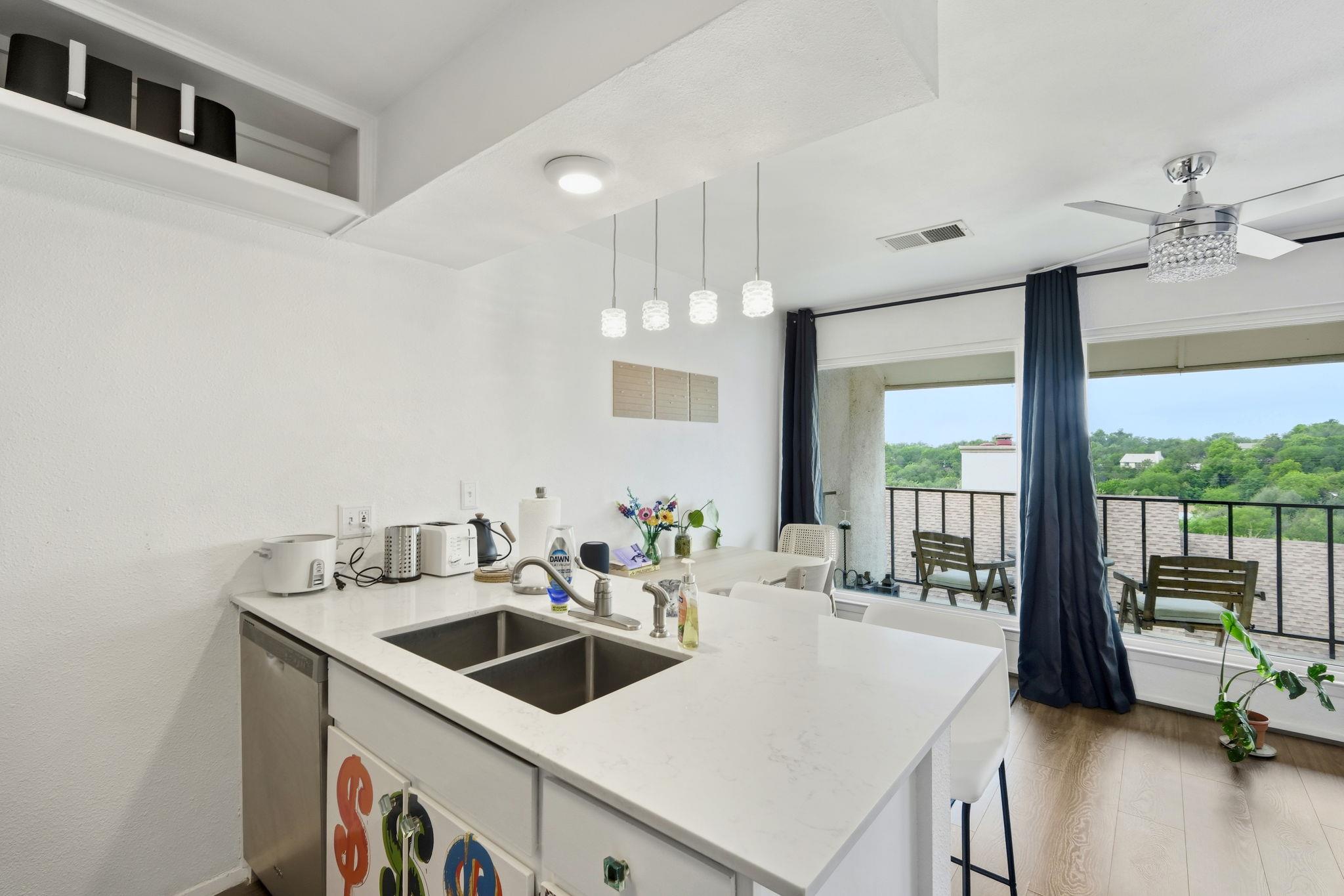 Kitchen island with a double basin stainless stee