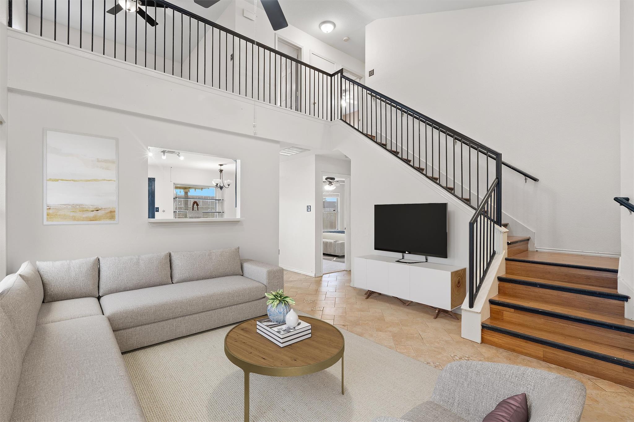 Natural light illuminates this spacious living ar