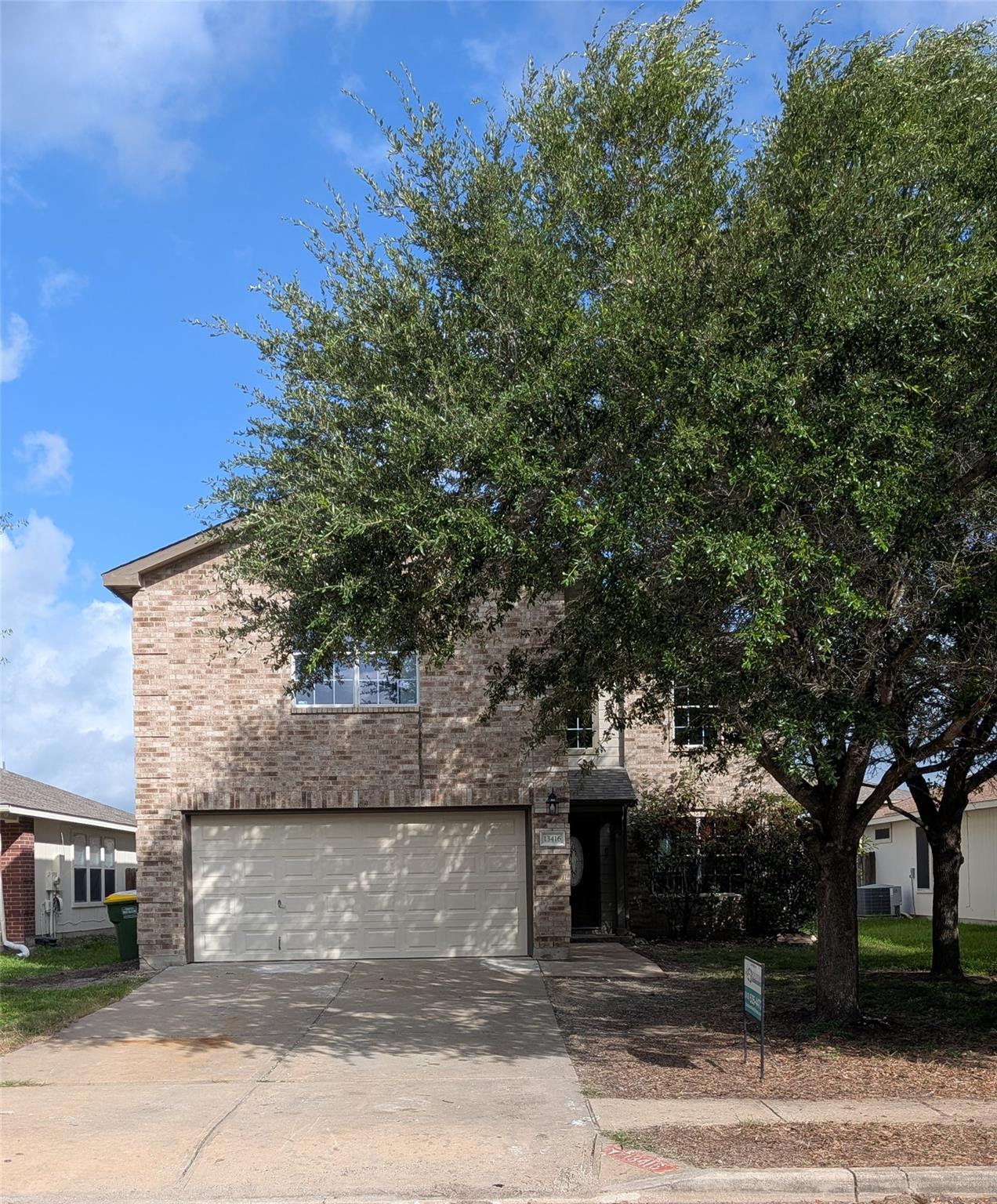 A classic brick facade awaits, nestled among esta