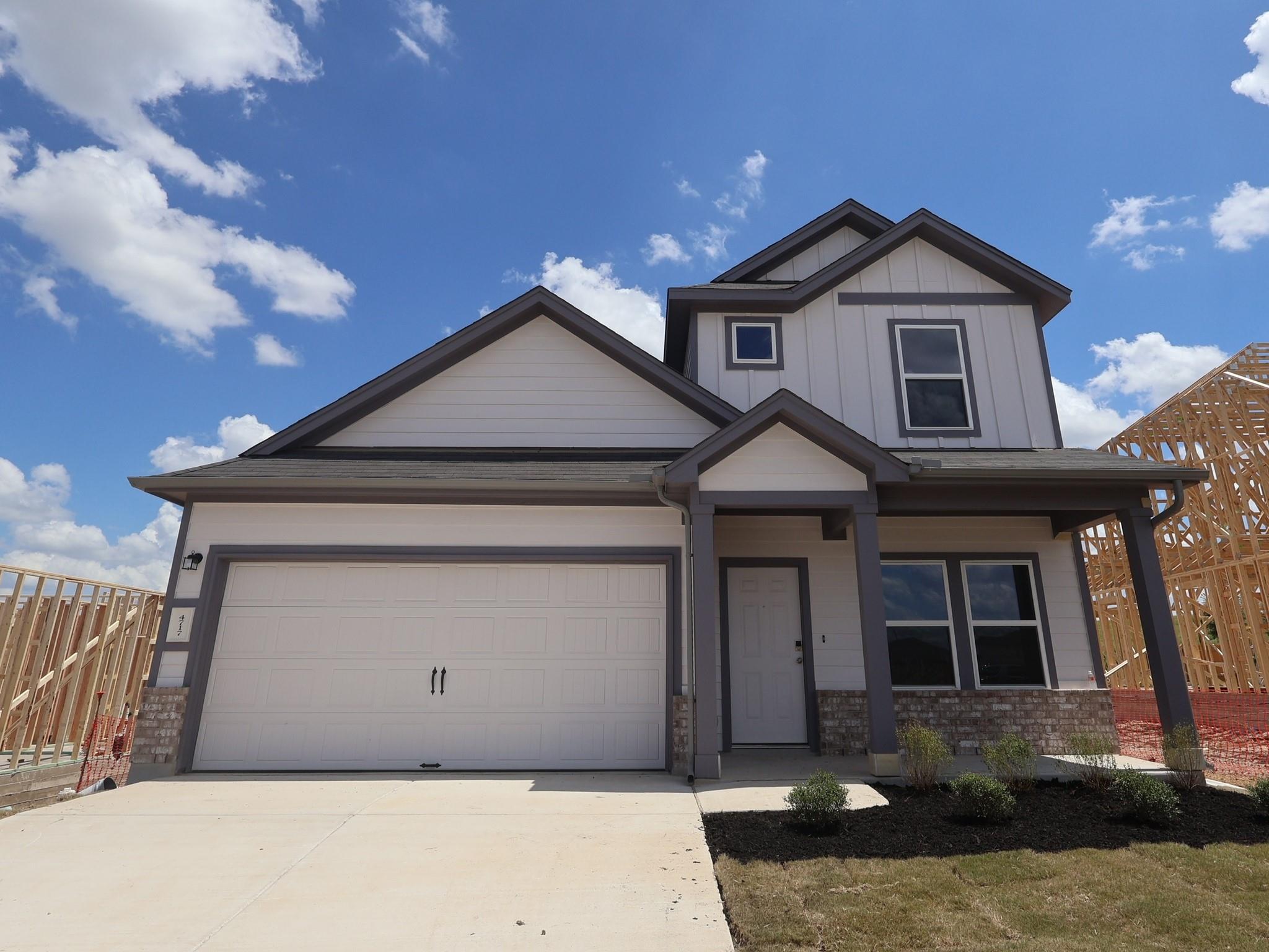 Modern dwelling offering a front-facing garage an