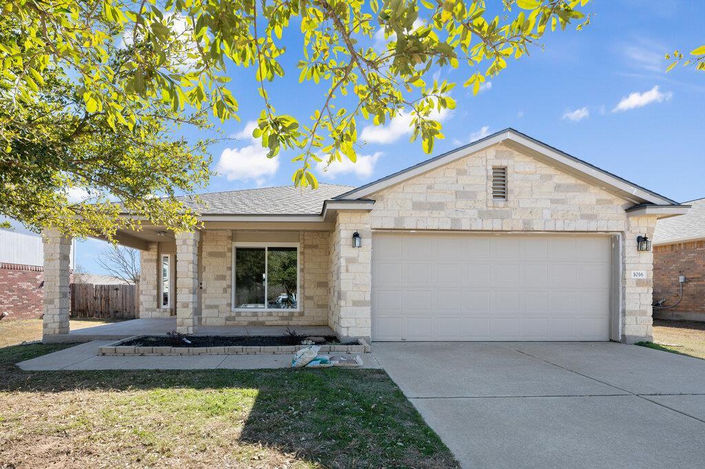 A well-maintained single-story home with a neat d