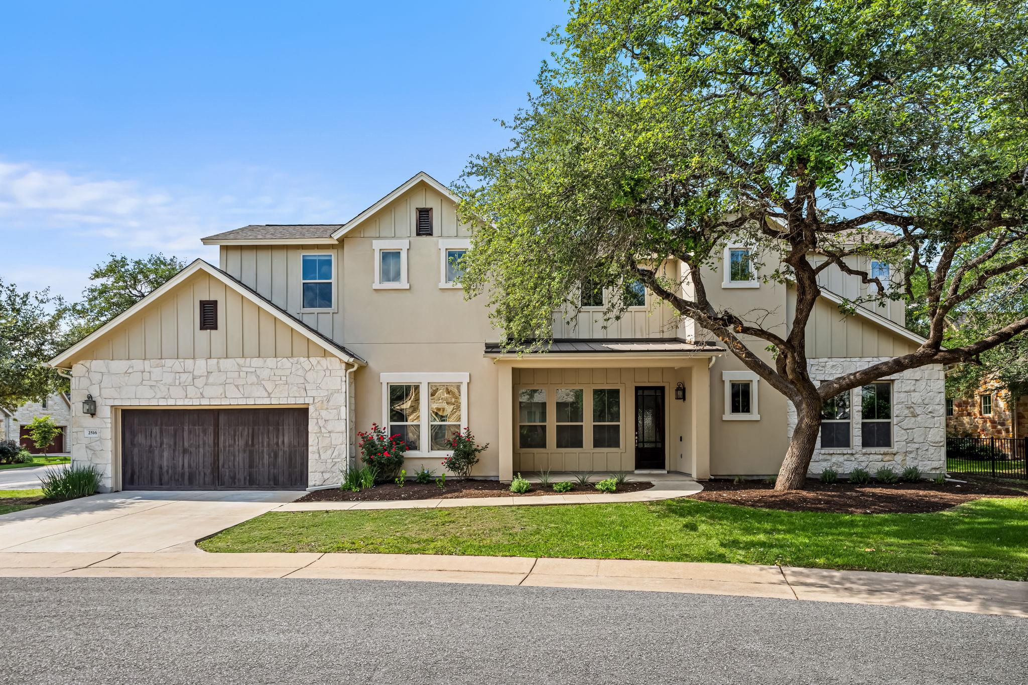 Stone and stucco exterior with board and batten a