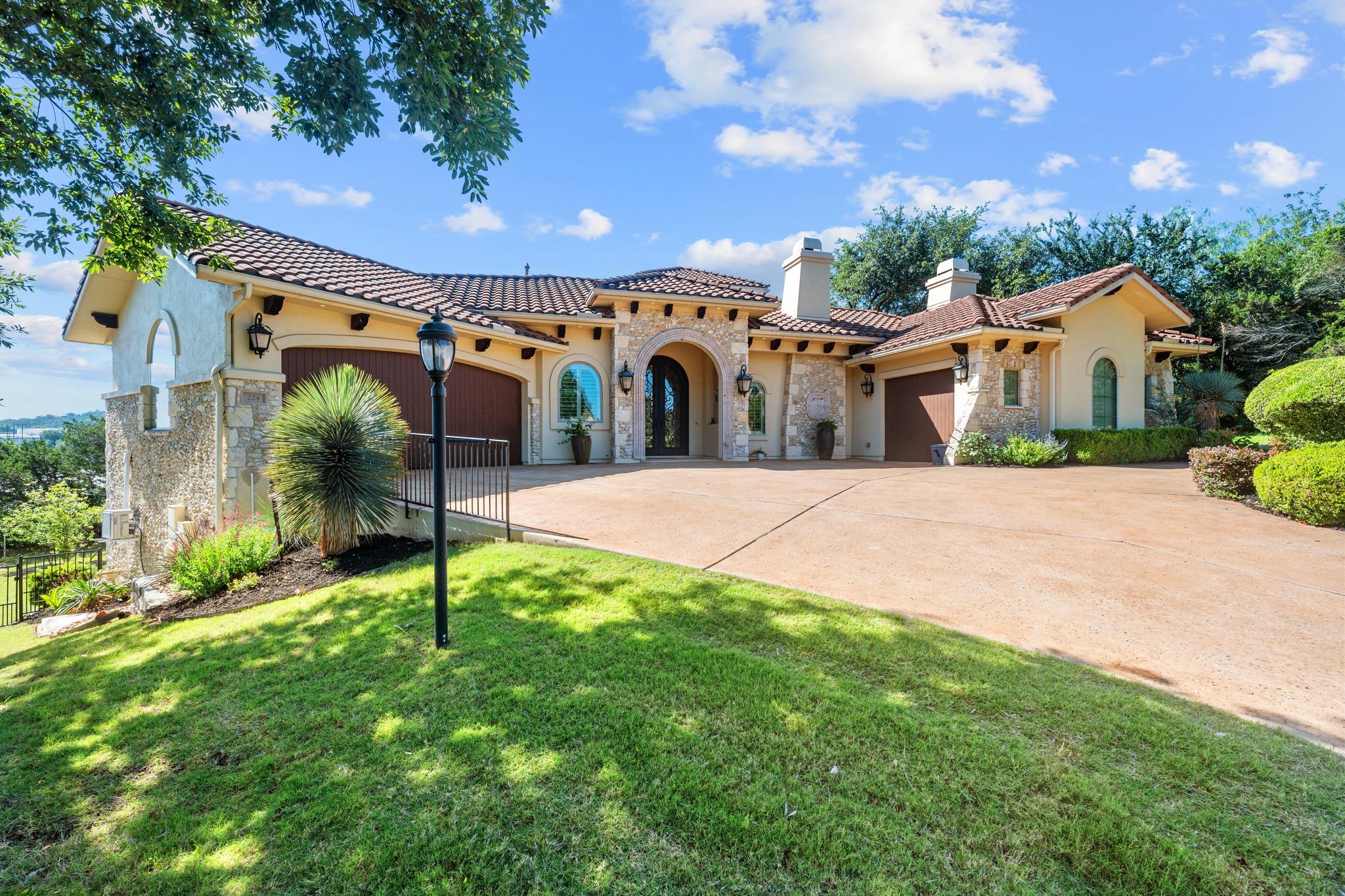 Mediterranean-inspired exterior featuring stucco 