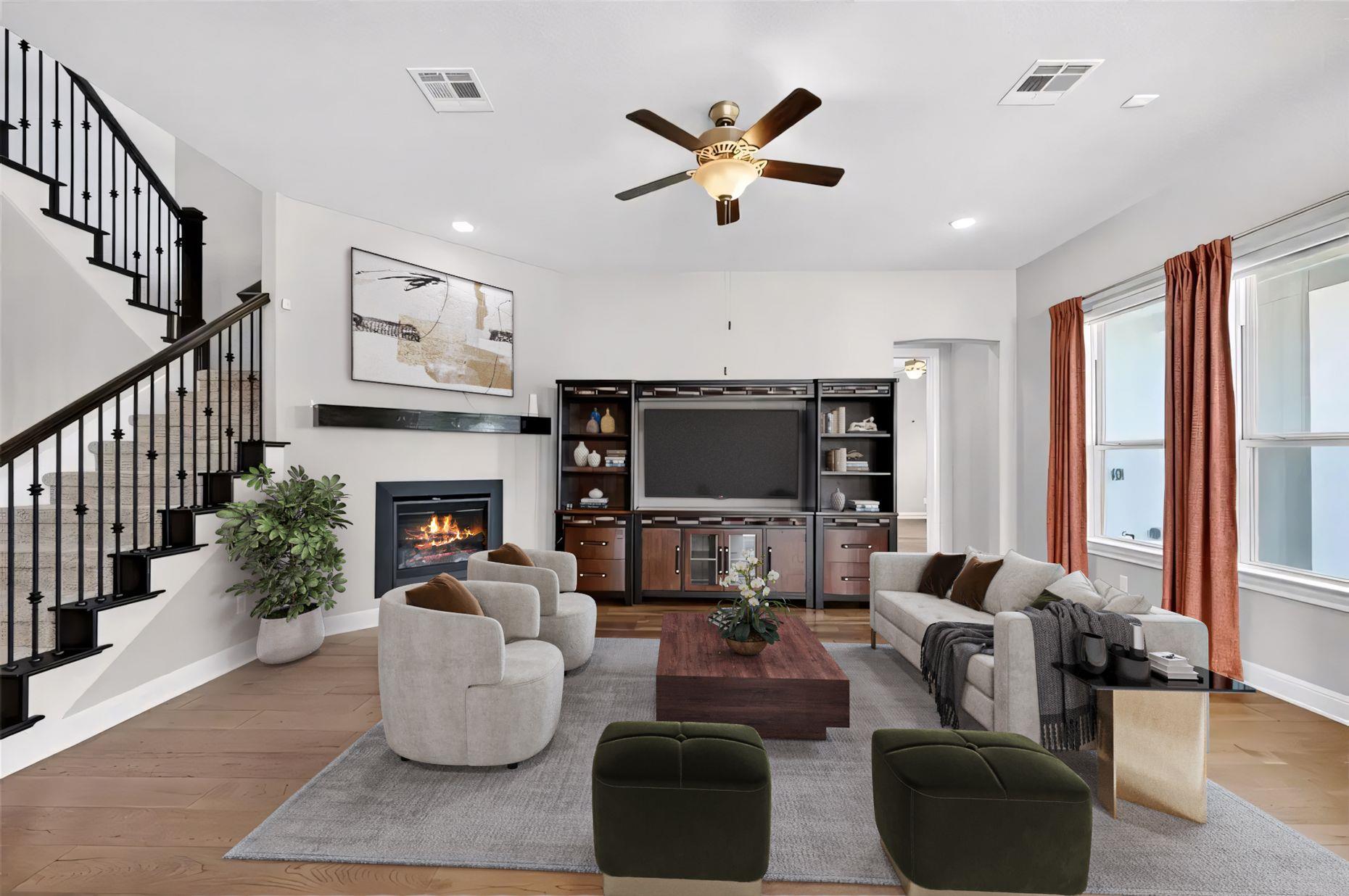 A well-lit living space features elegant hardwood