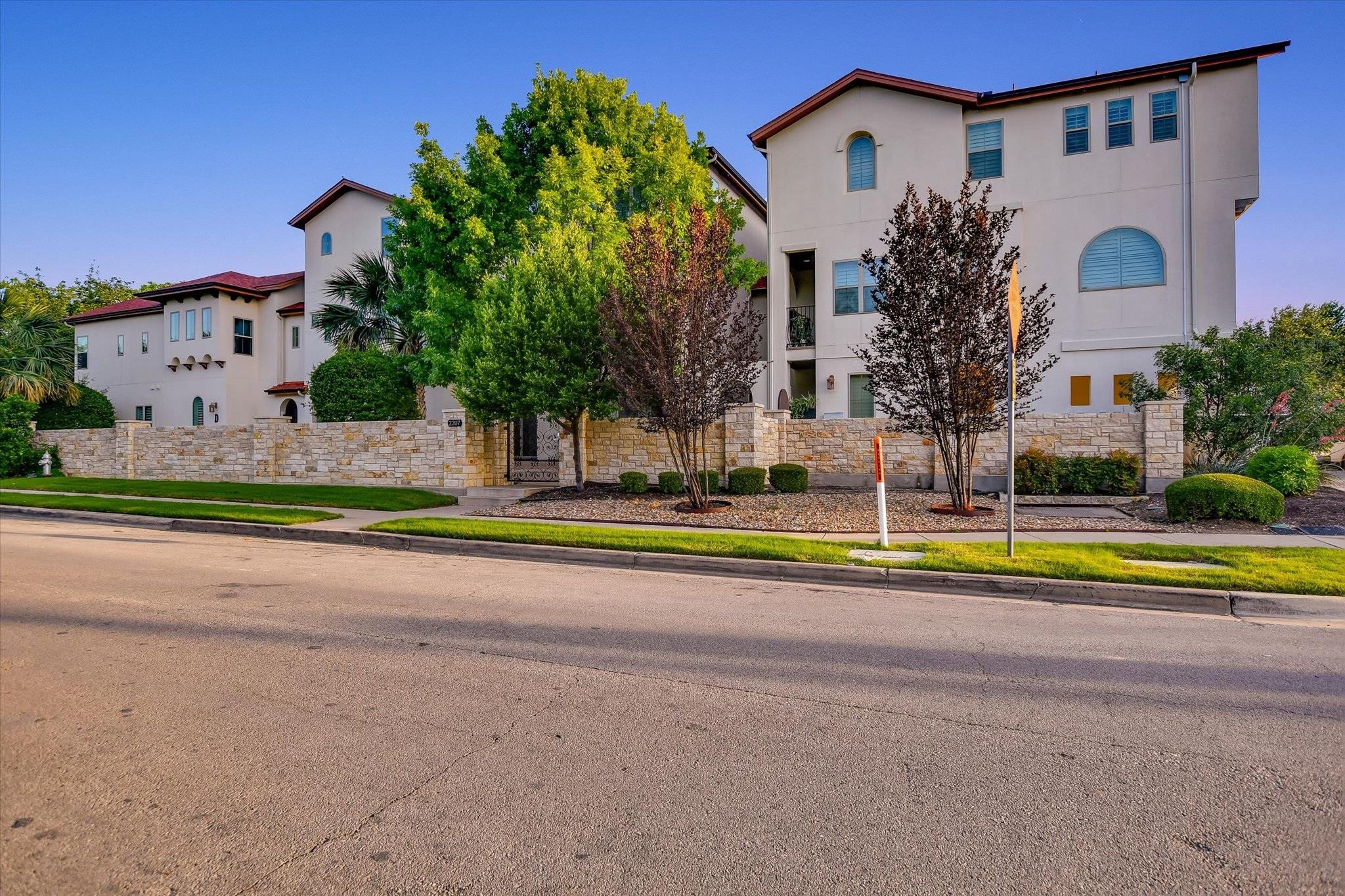 Spanish Colonial style building with stucco exter