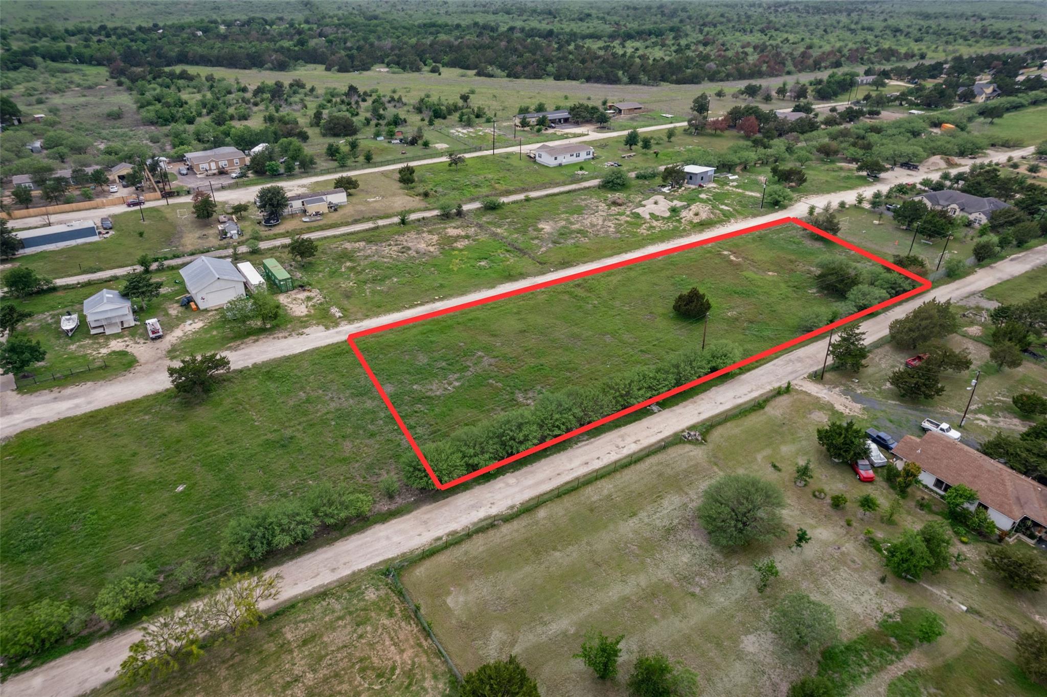 Expansive land parcel featuring a rectangular bou