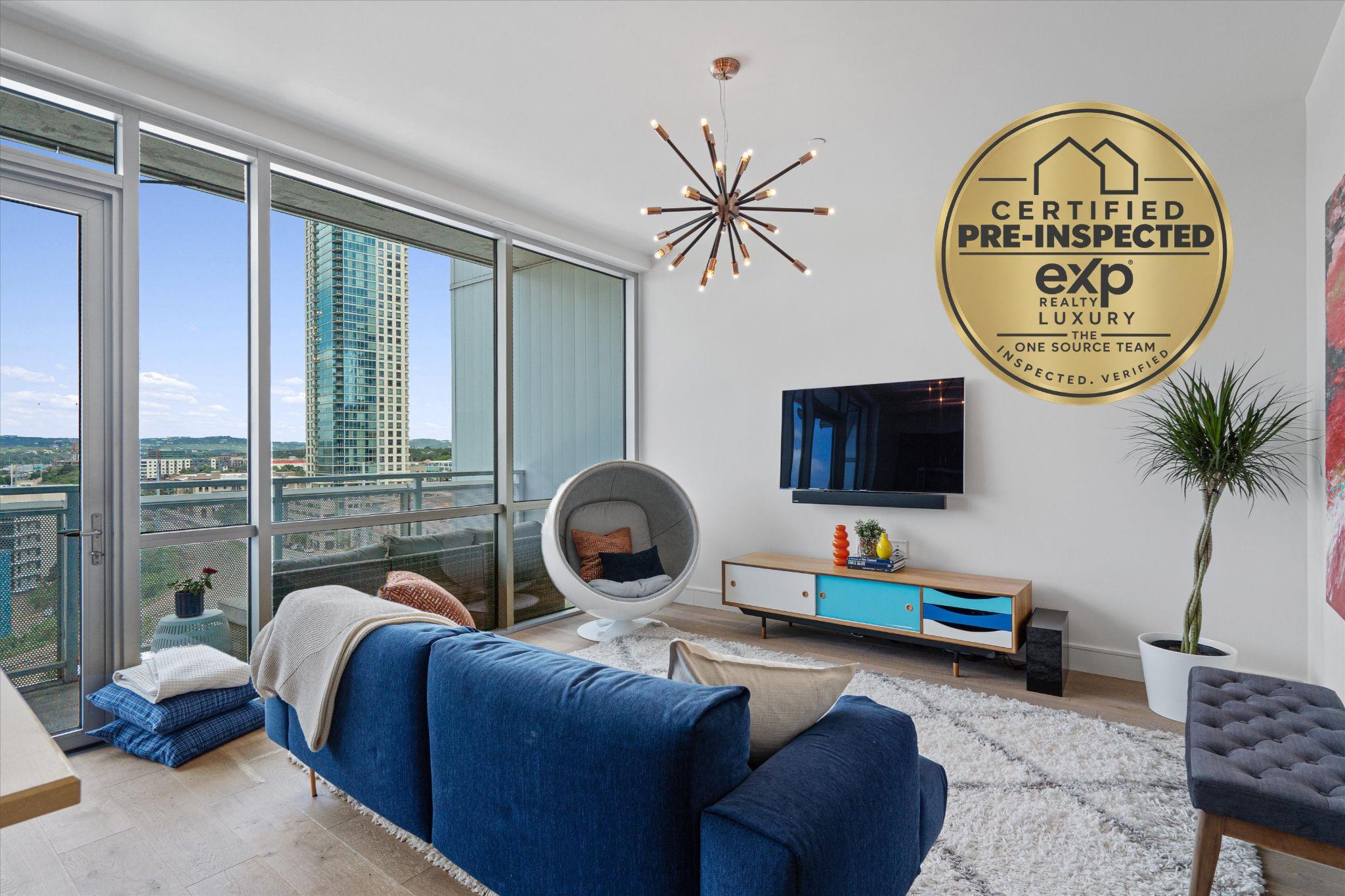 Towering floor-to-ceiling windows frame cityscape