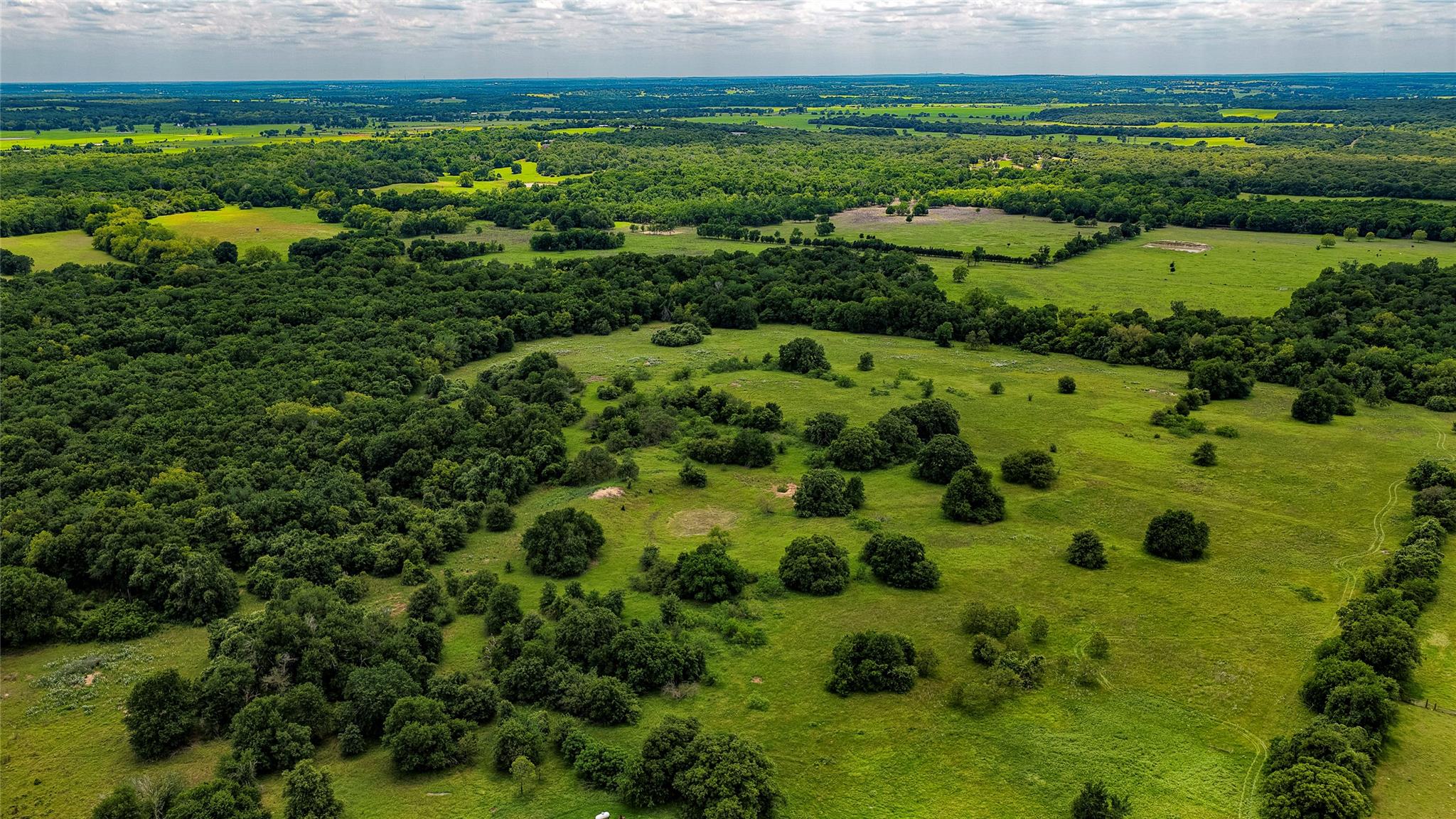 Expansive natural landscape featuring a mix of ma