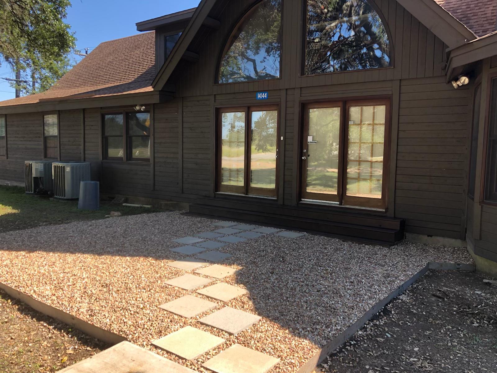 Distinctive exterior with rich brown siding and a