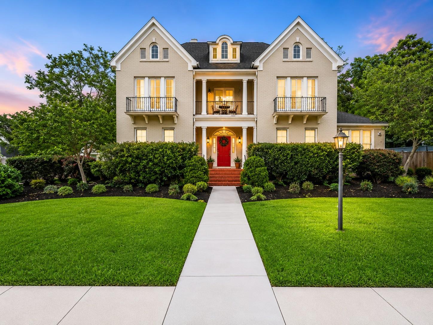 An inviting entry with a vibrant red door welcome