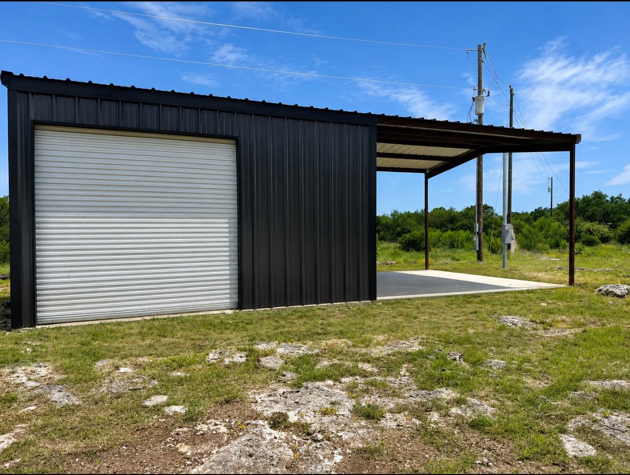 Metal building with a corrugated roll-up door, fe
