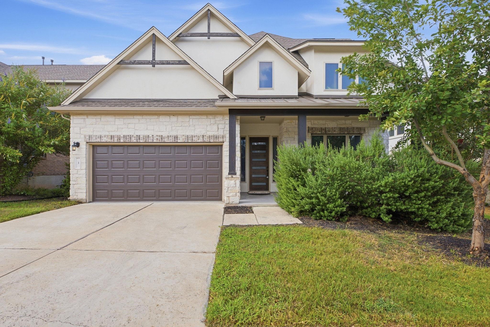 Gable accents and limestone masonry define the ex