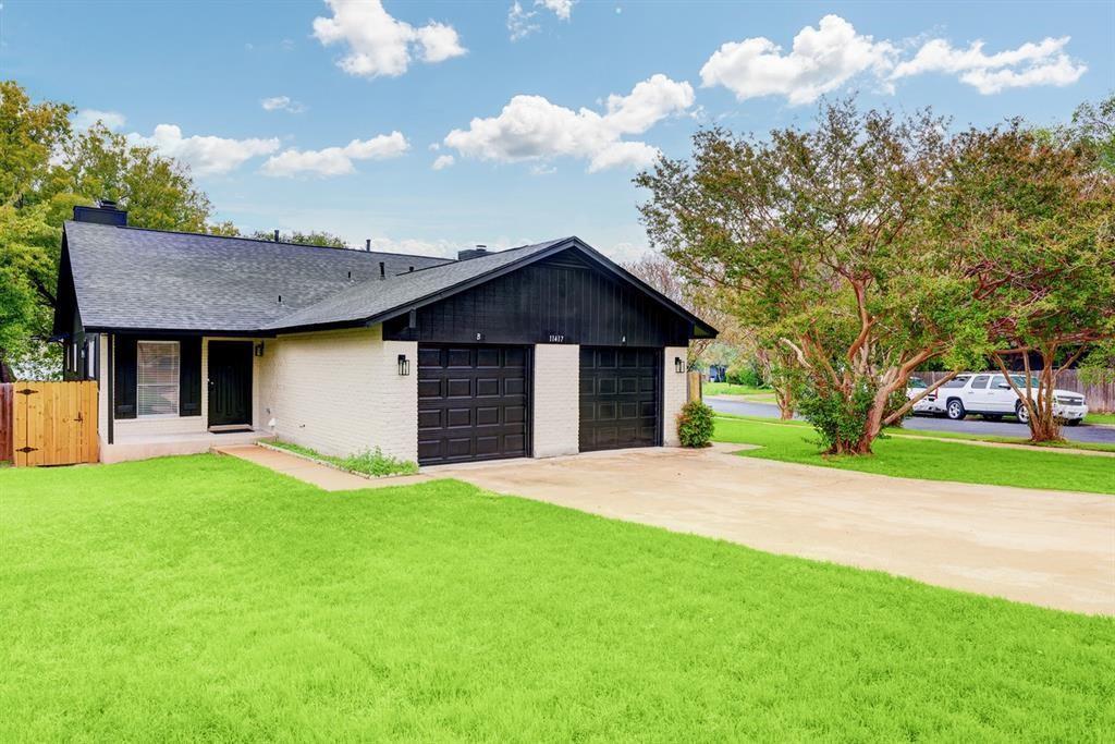 Contemporary single-story residence with a dark s
