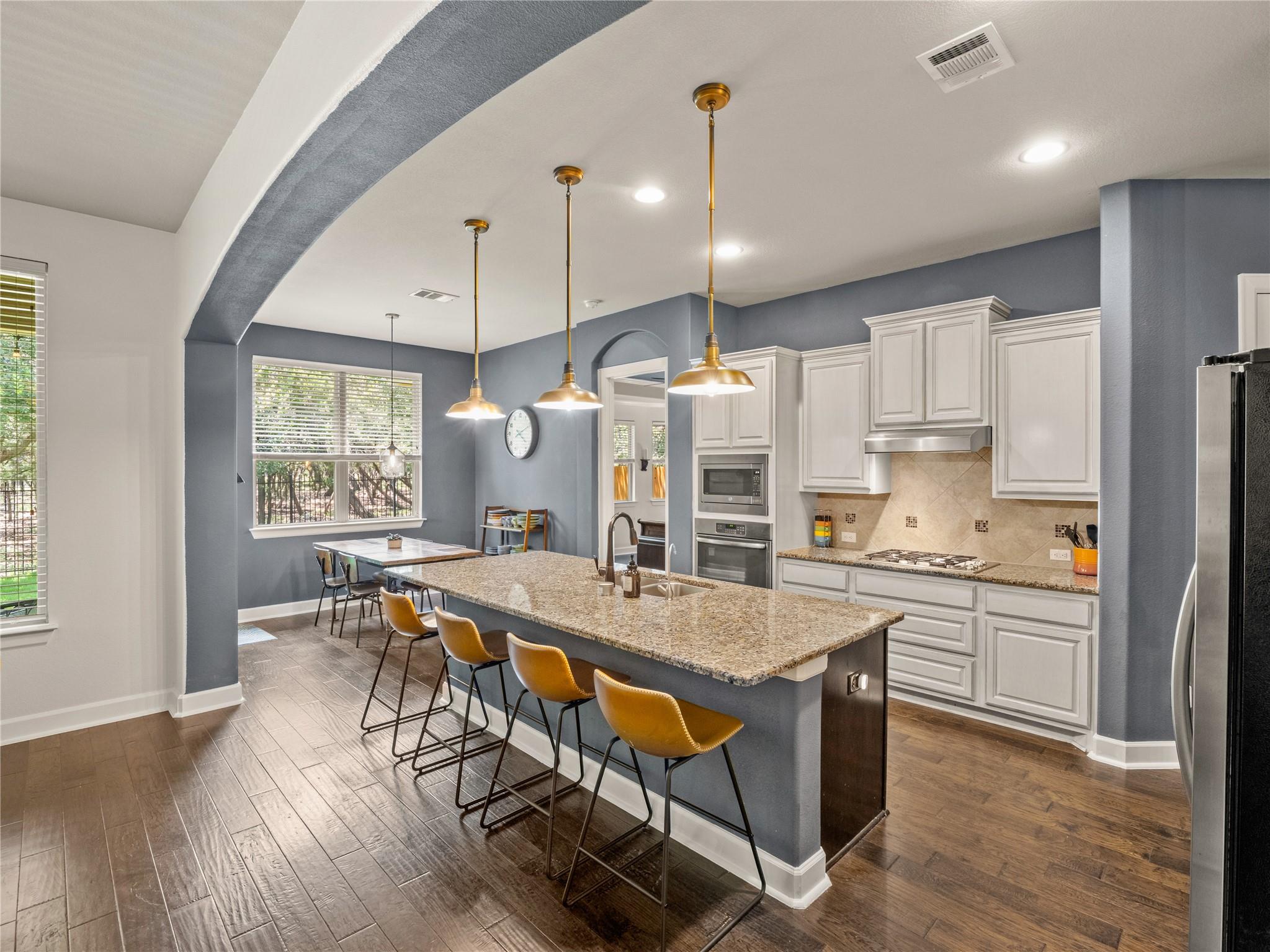 A gourmet kitchen showcasing an inviting island a