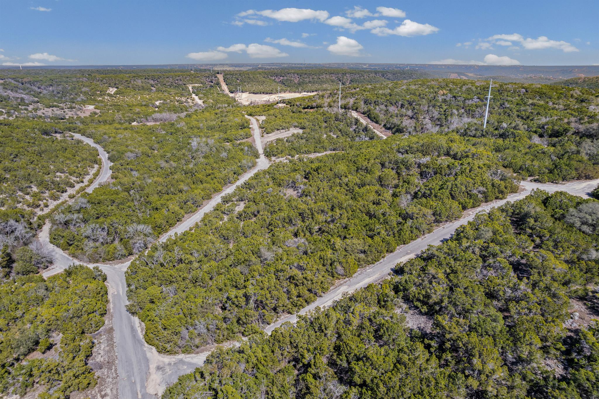 Expansive undeveloped land featuring mature green