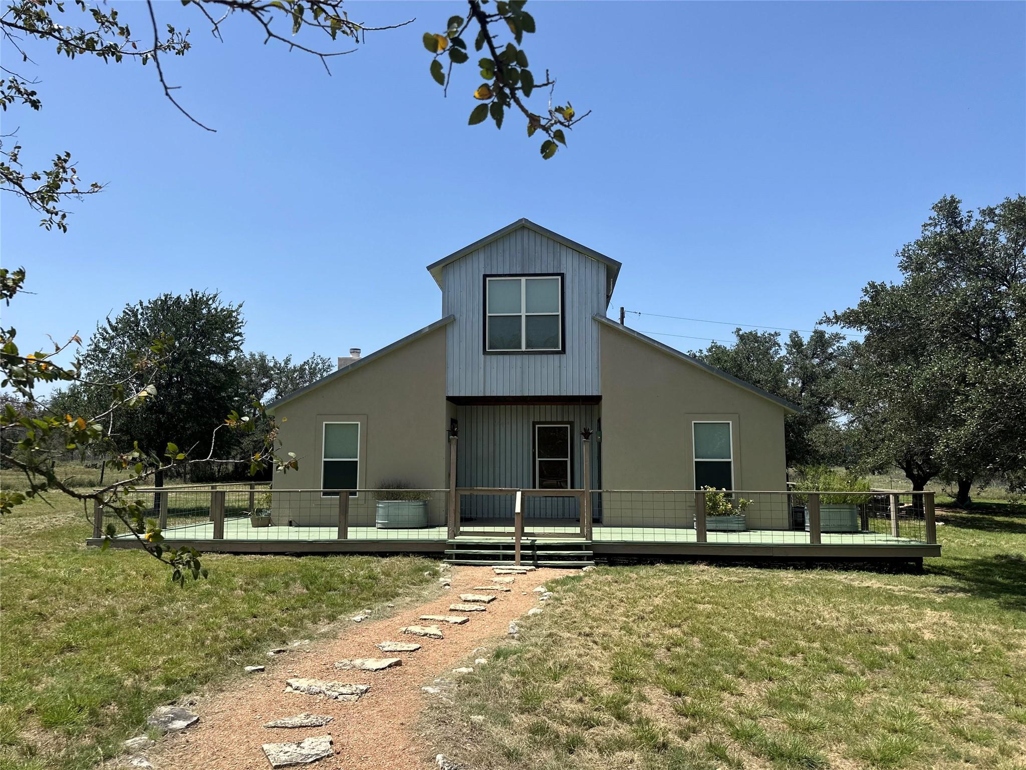 Two-story exterior with a central vertical siding