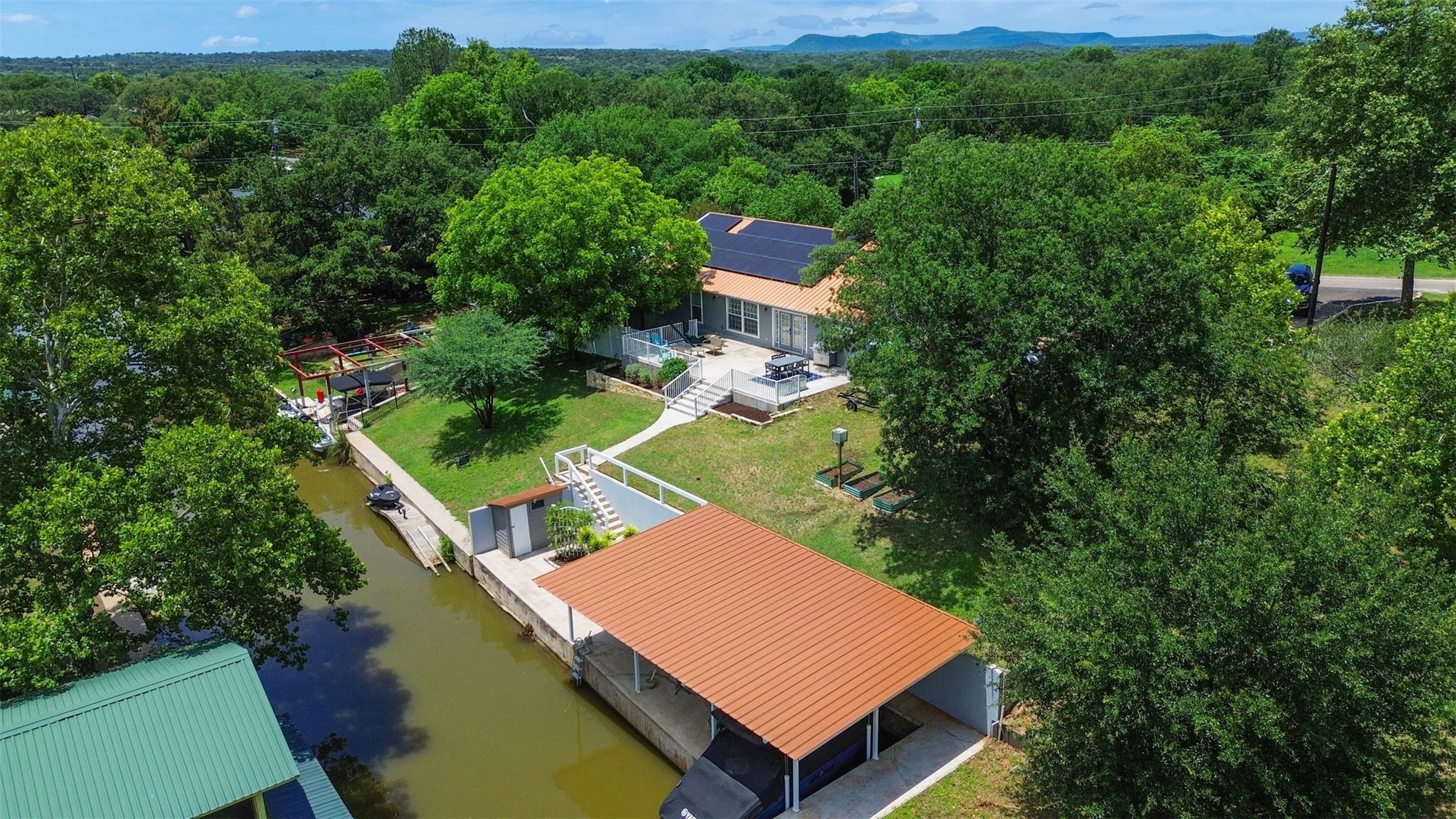 Waterfront property featuring a private boat dock