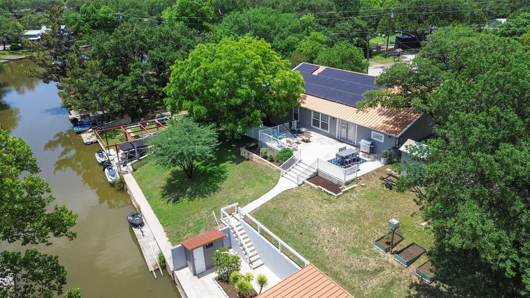 Waterfront property featuring a private boat dock