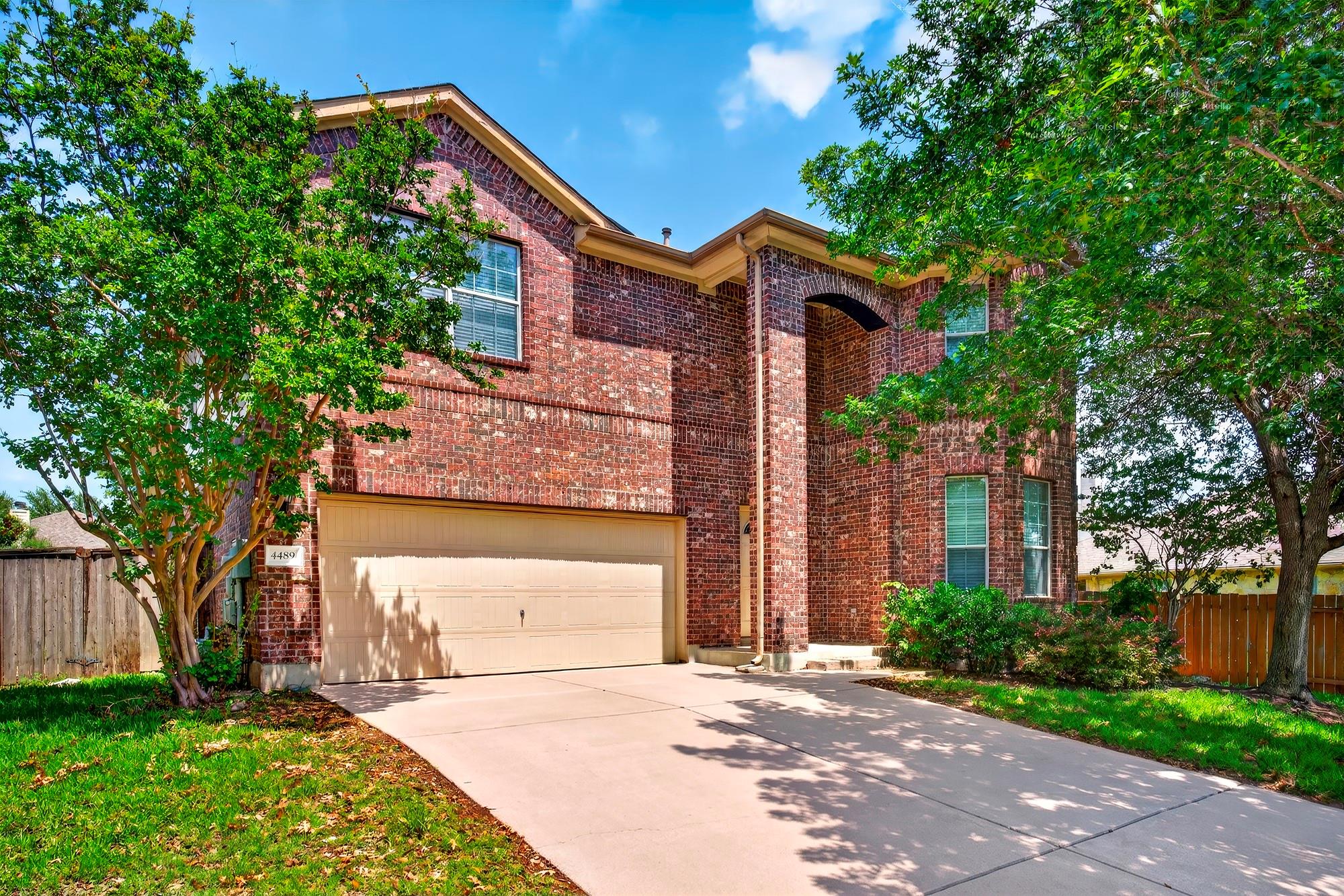A classic brick exterior offers curb appeal, comp