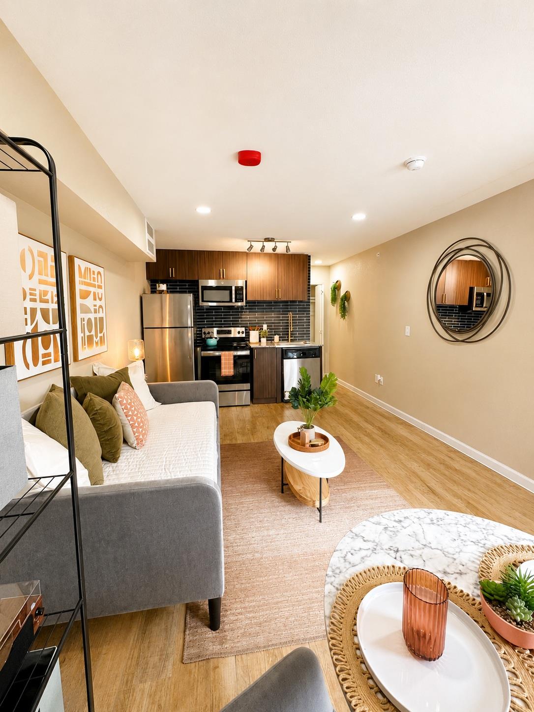 Open-concept living space featuring wood-finish f