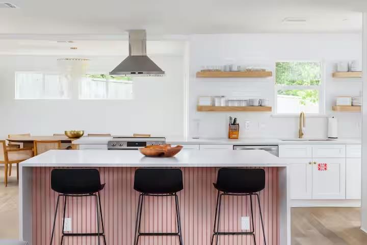 Open-concept kitchen featuring a large island wit