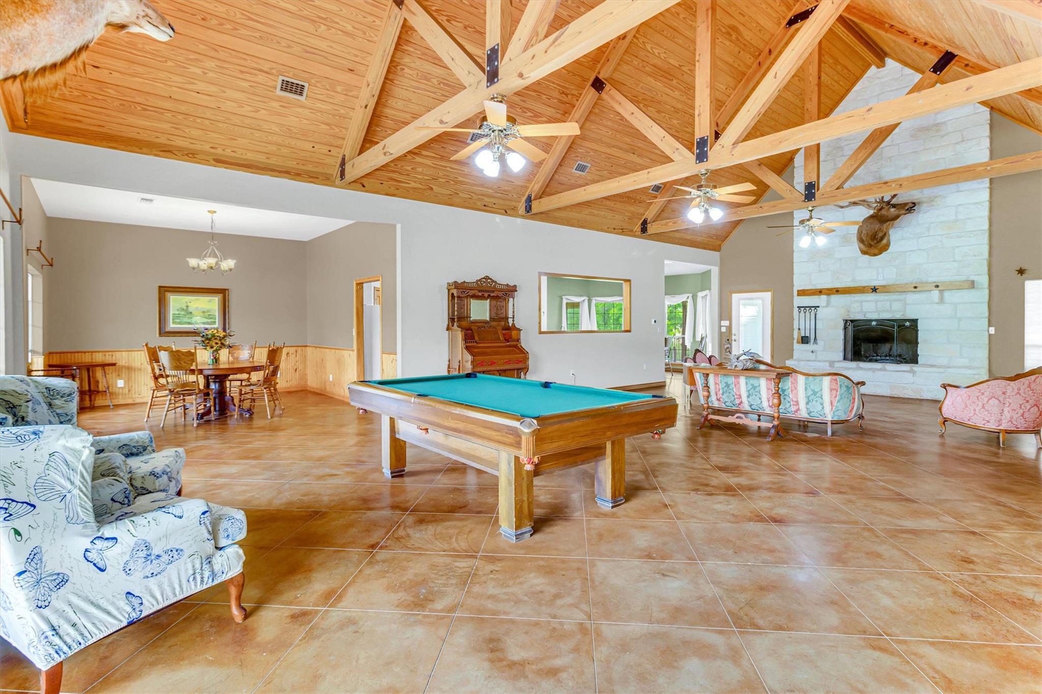 Vaulted wood-paneled ceilings with exposed beams 