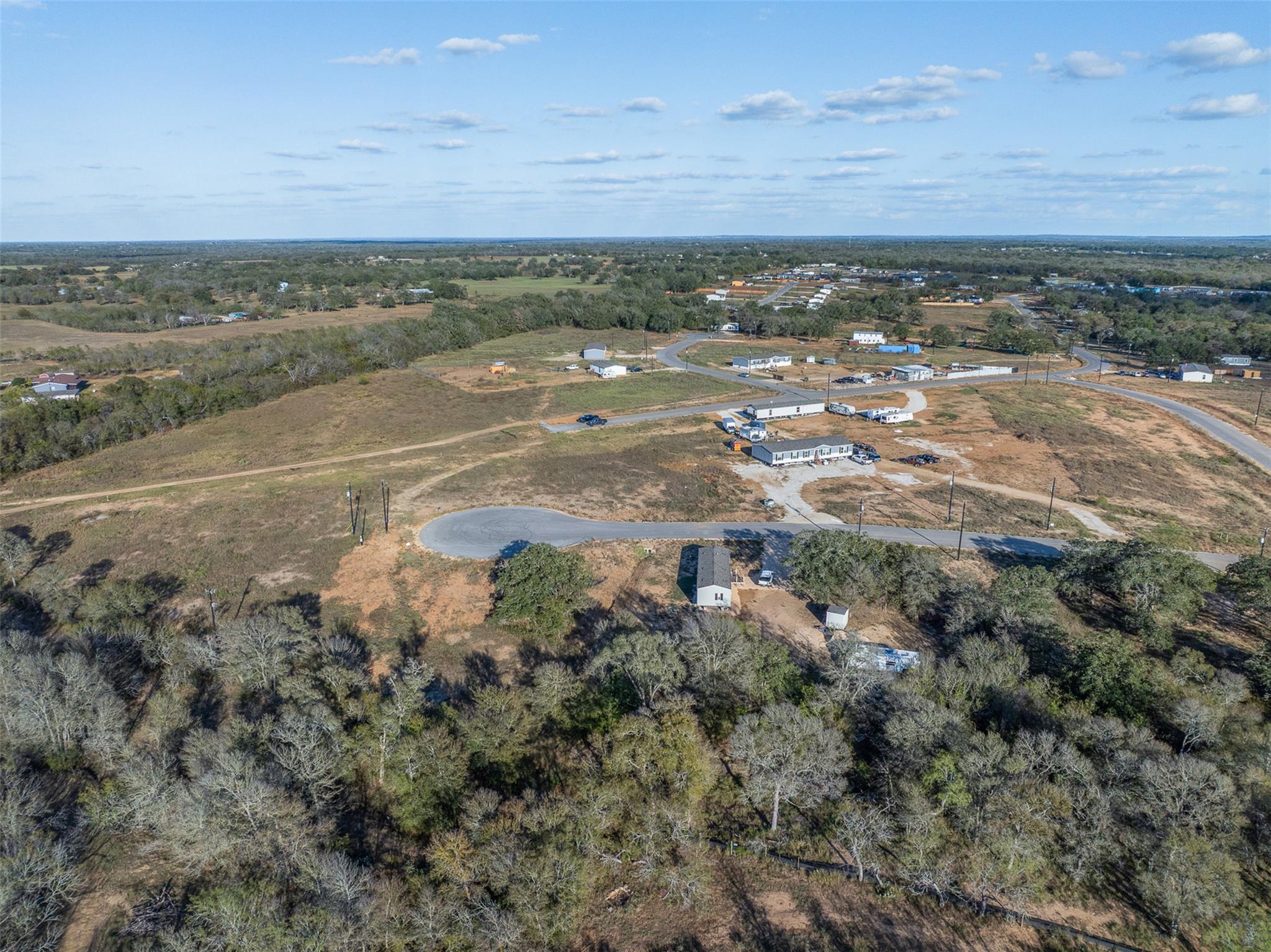 Aerial view of property and surrounding area feat