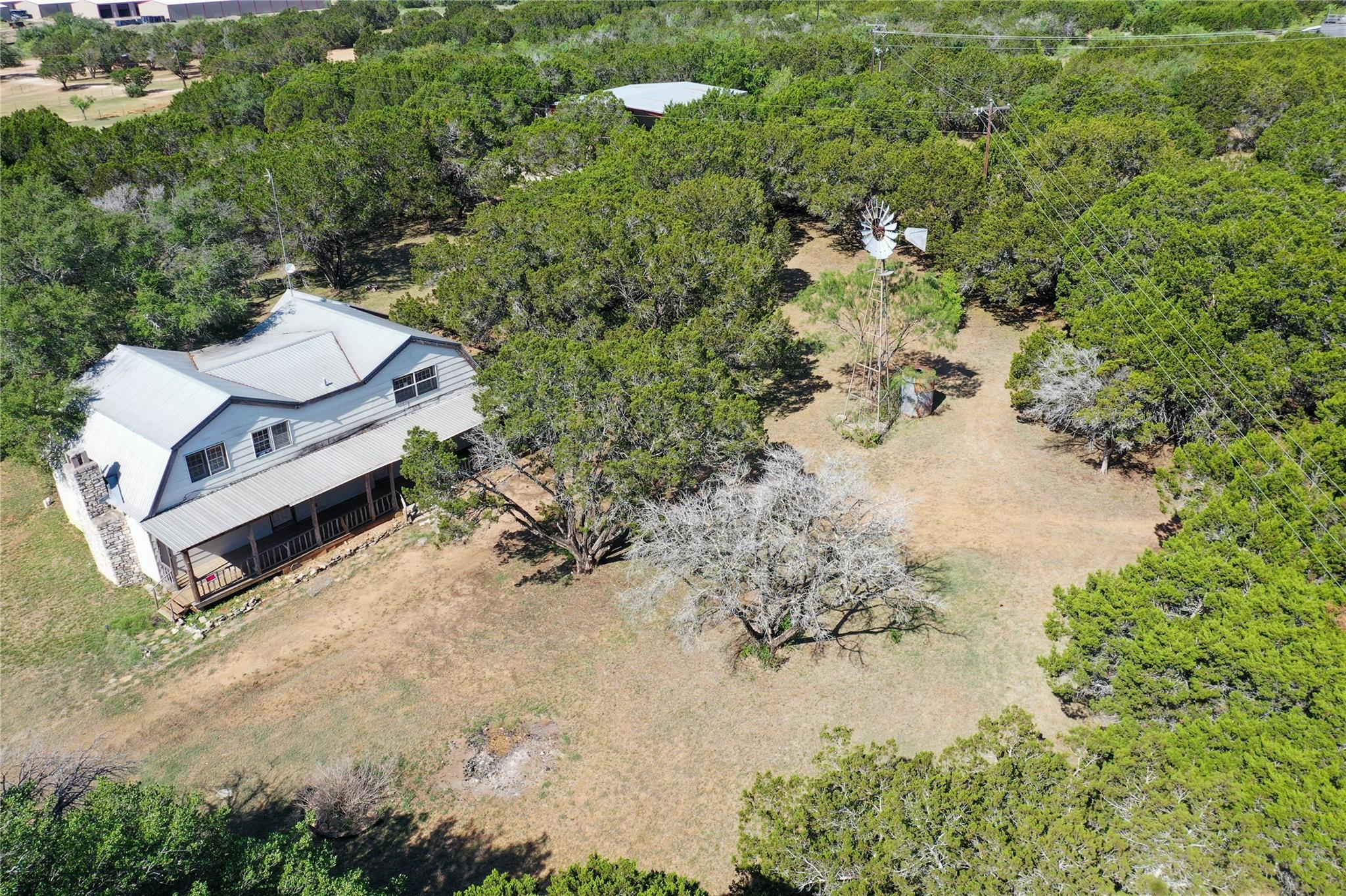 Two-story residence with a metal roof and an exte