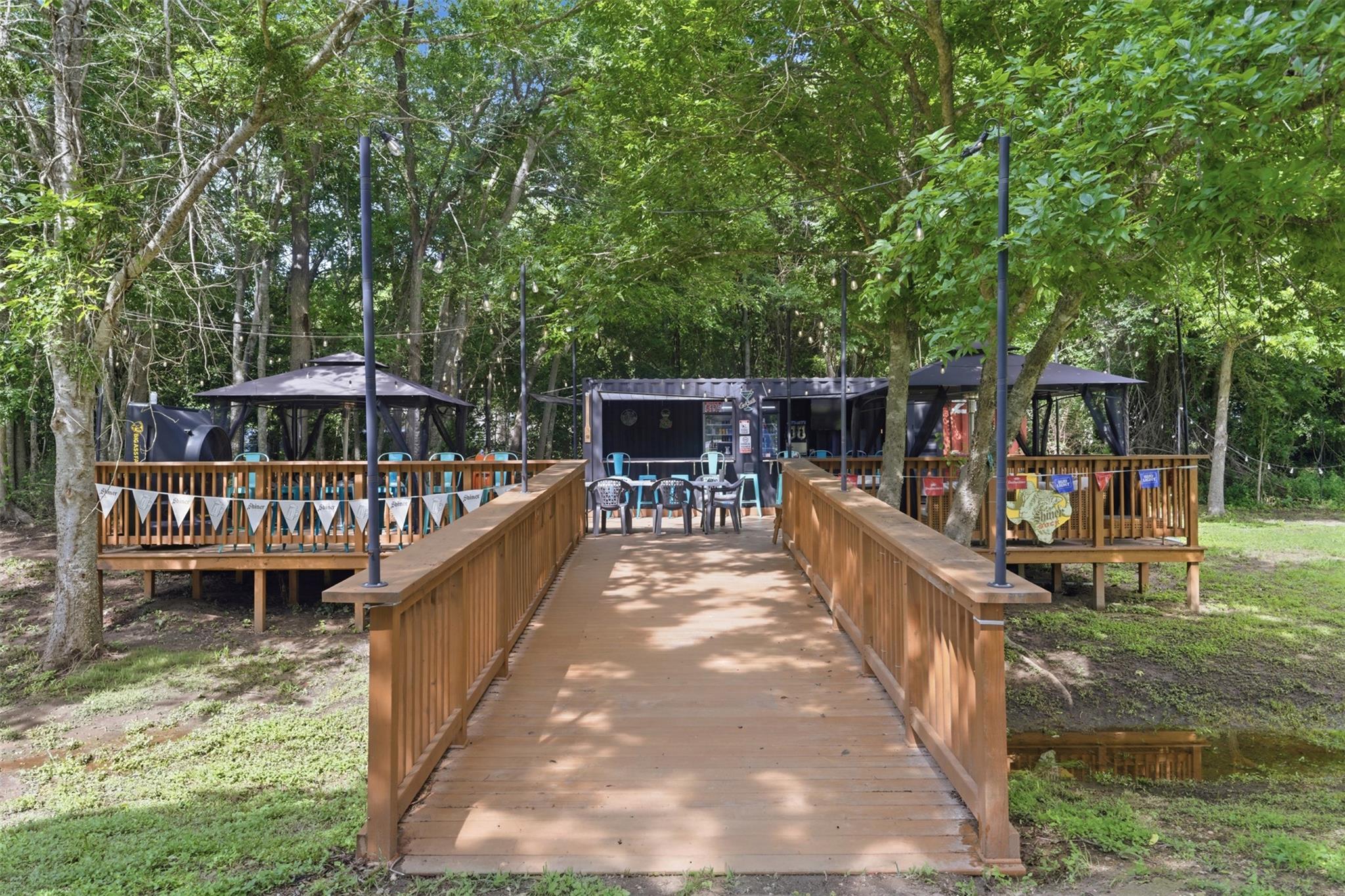 Wood-finish ramp with sturdy railings providing a