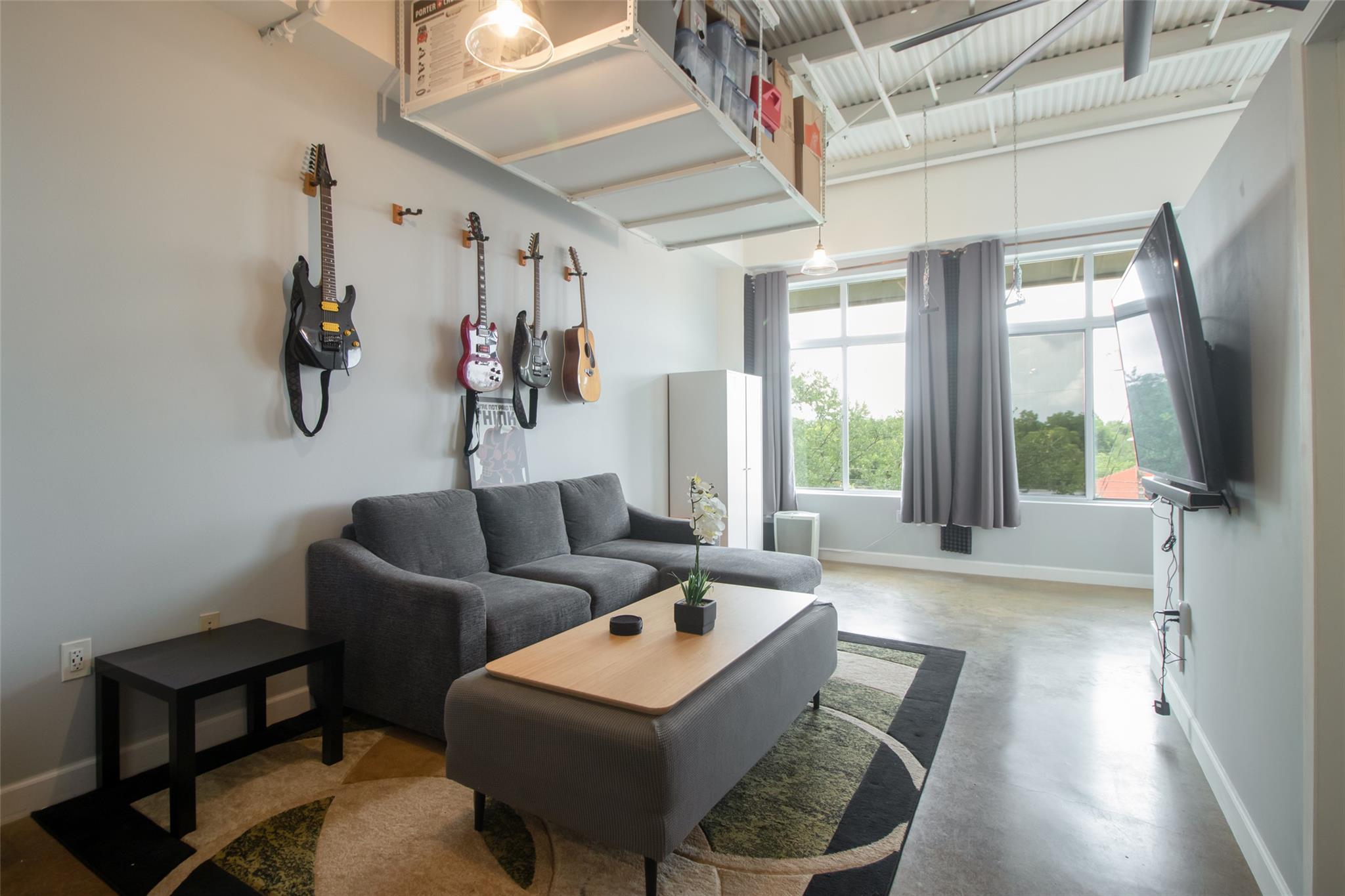 Concrete floors and high ceilings frame a versati
