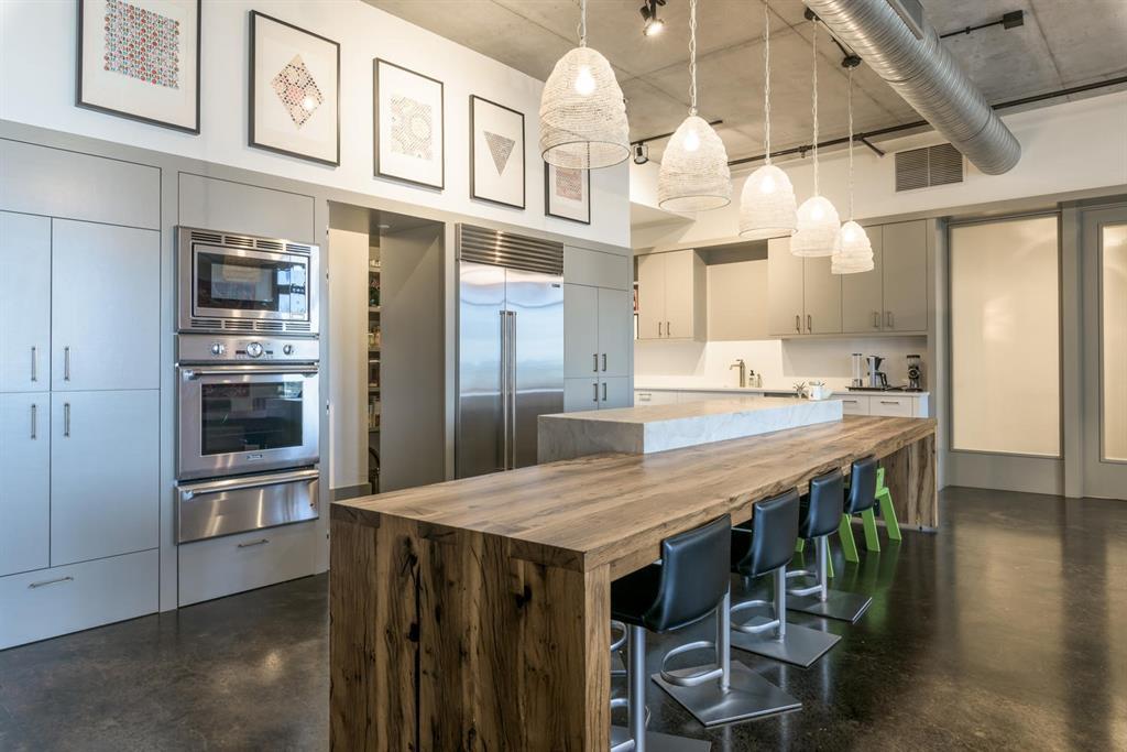 Spacious kitchen featuring a large wood-finish is
