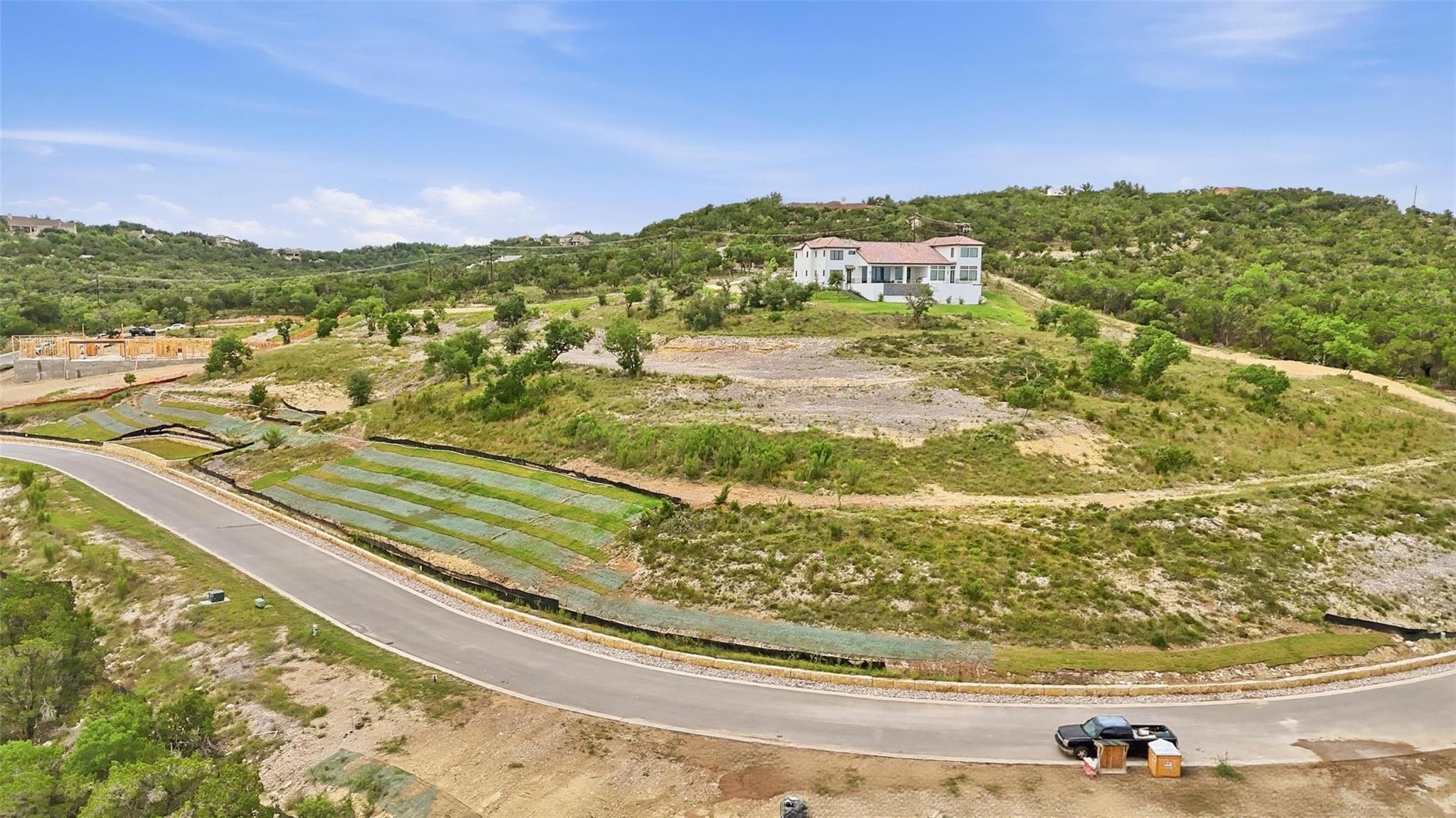 A tranquil, elevated lot offers sweeping natural 