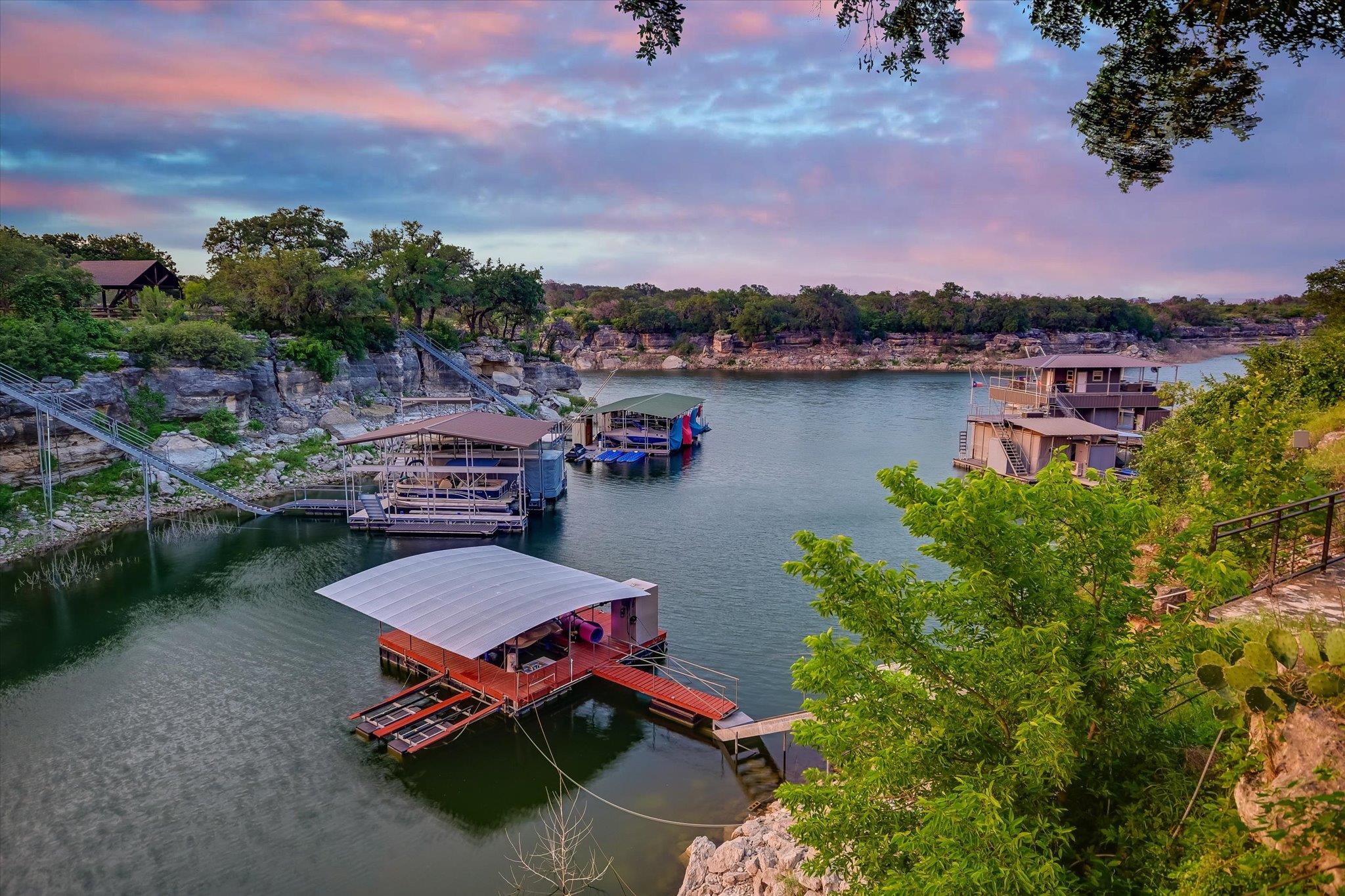 Waterfront setting featuring multiple boat docks 