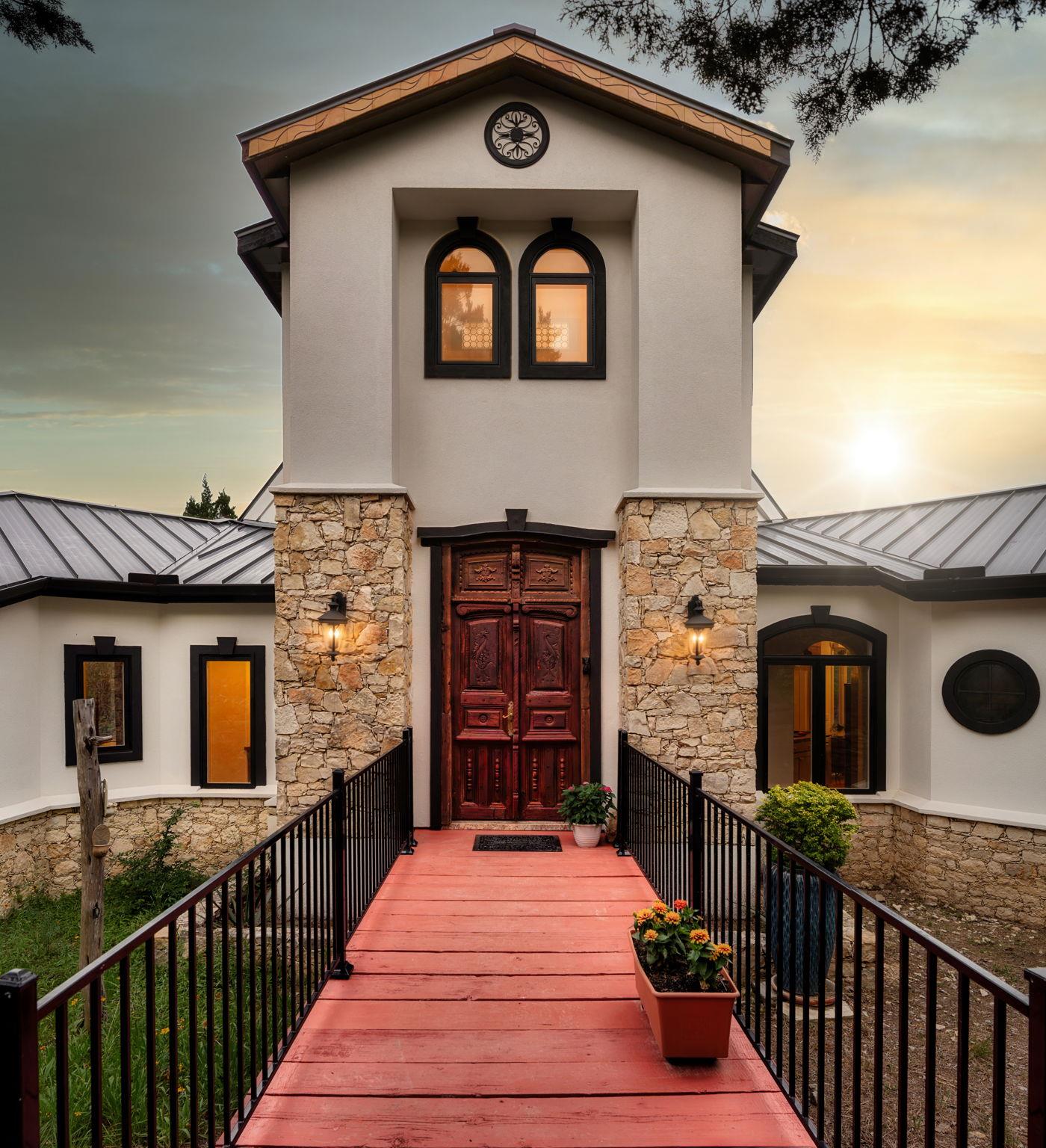 A striking entry with a rich wooden door welcomes